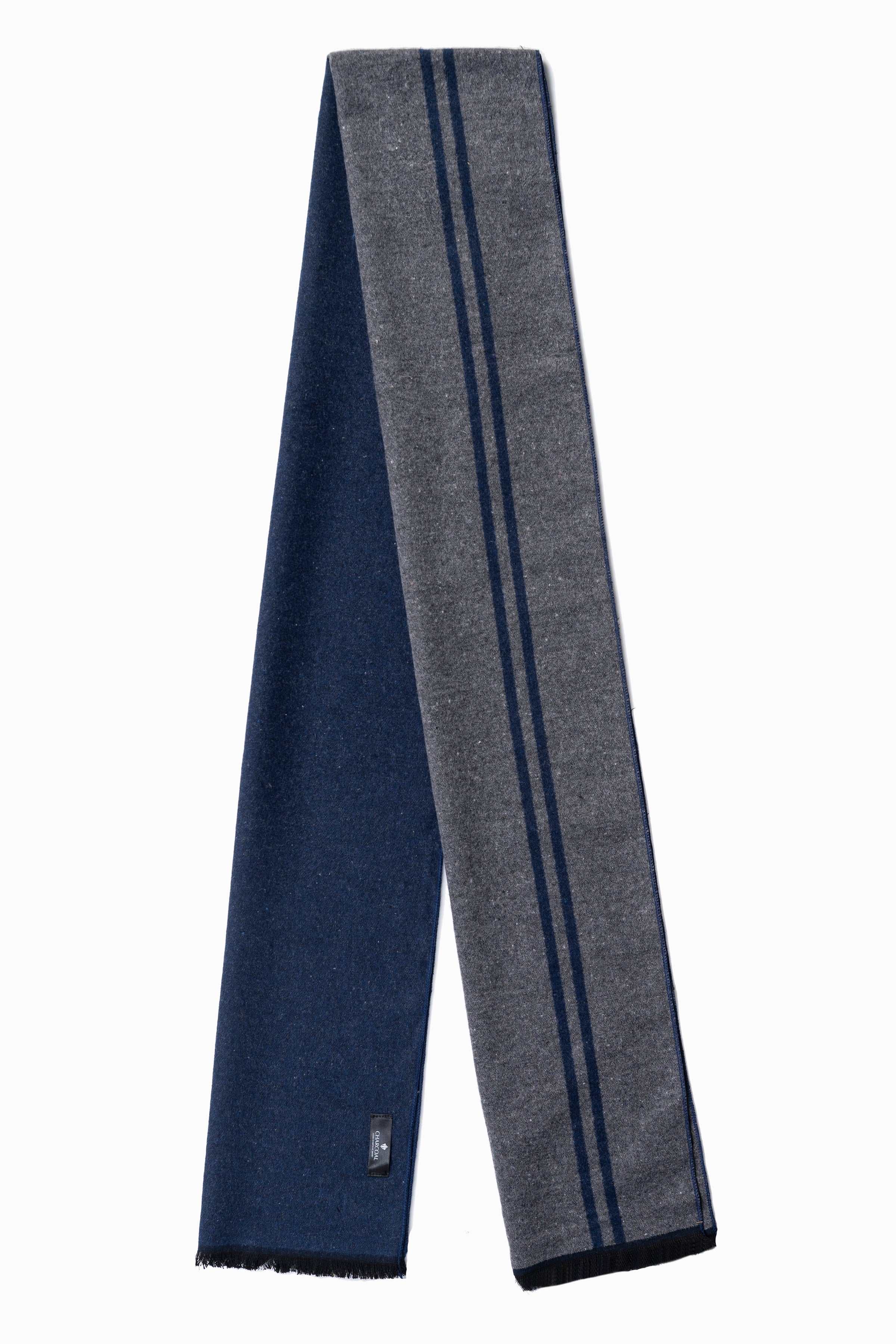 Two-tone striped scarf in navy and gray, fringed ends