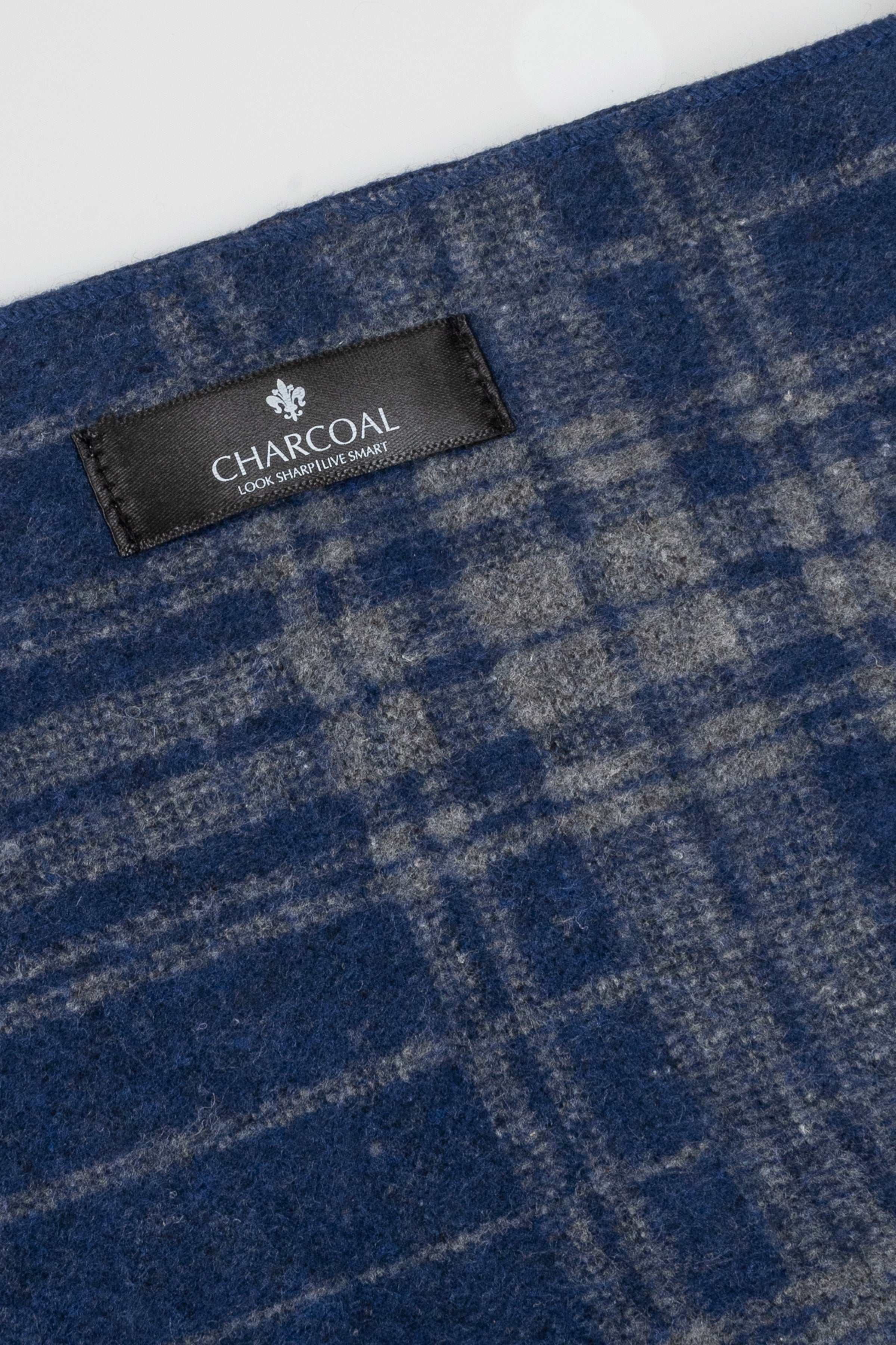 Blue plaid scarf with CHARCOAL brand label