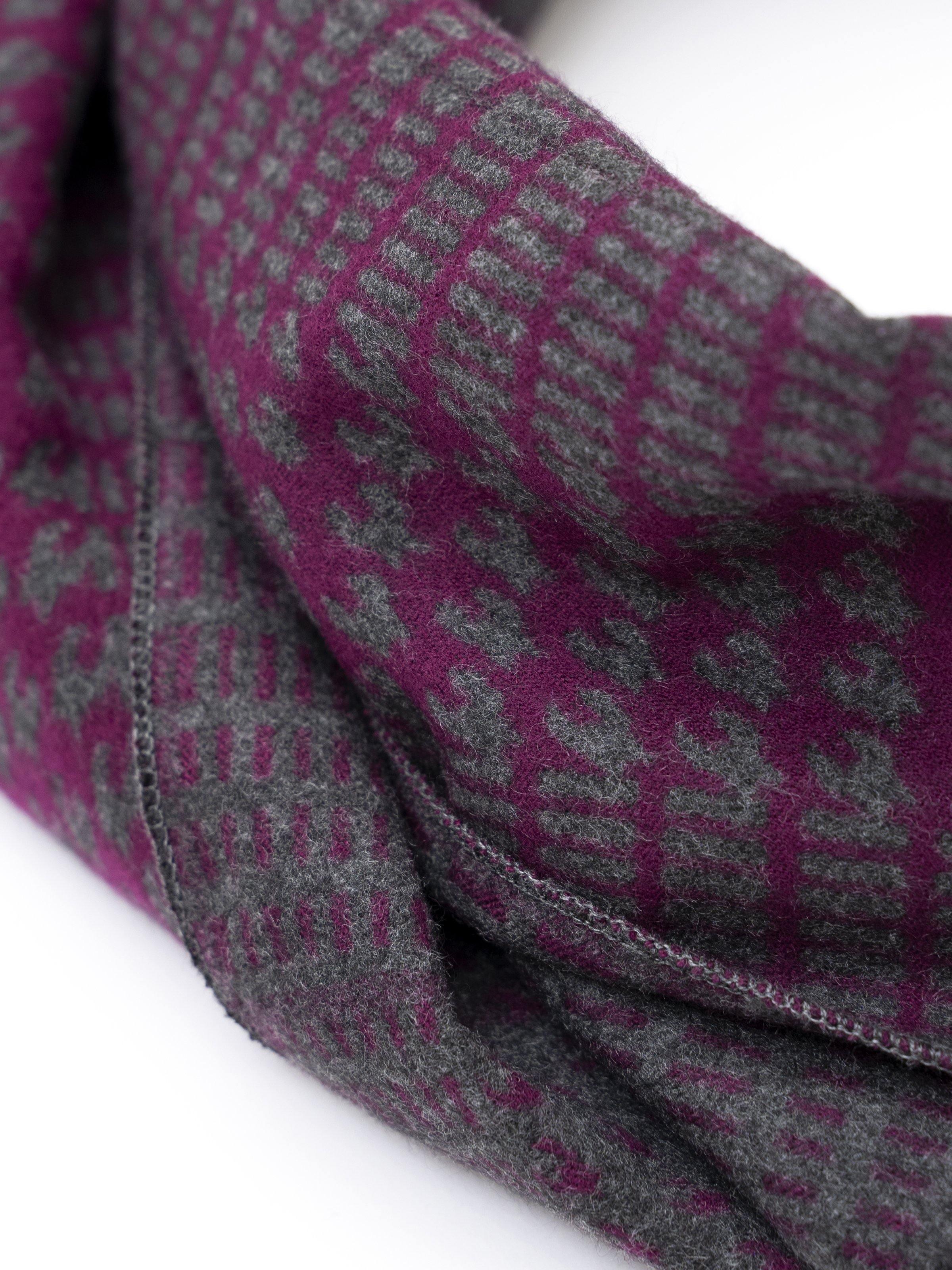Purple and gray woven scarf fabric with close-up pattern detail
