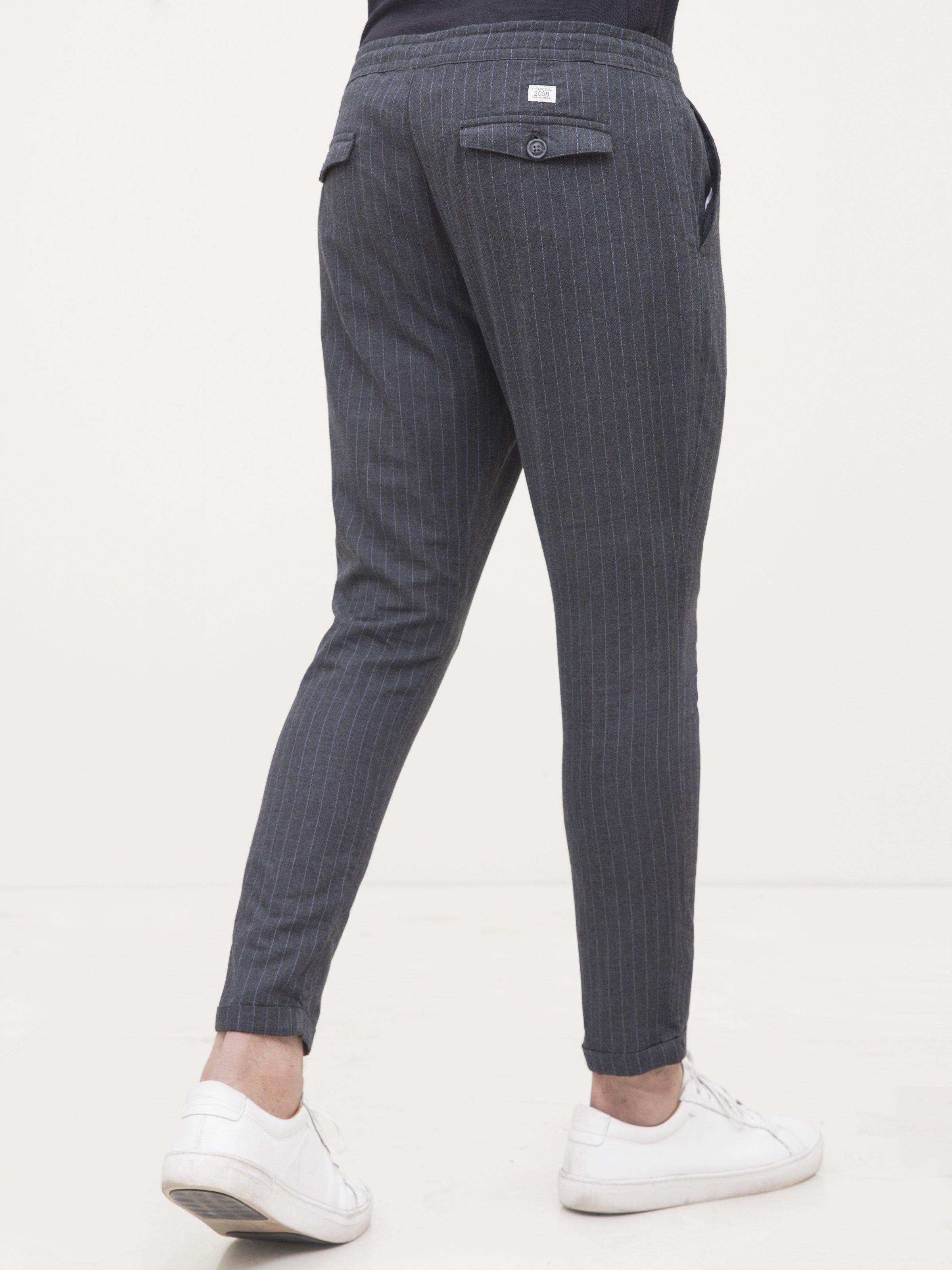 Charcoal black casual trousers with drawstring waist and slim tapered legs