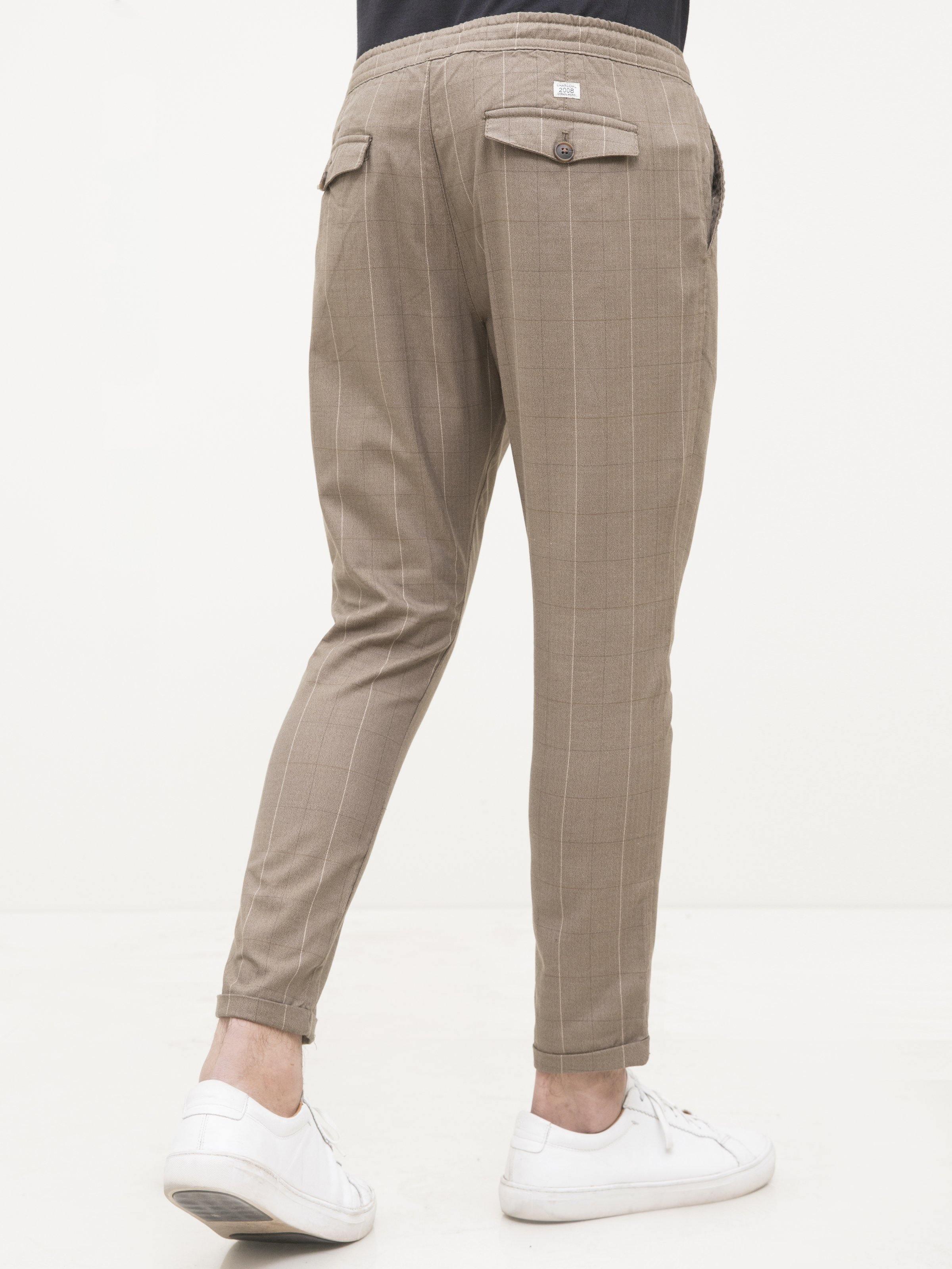 Dark khaki casual trousers, cuffed hem, side pocket details, slim straight leg