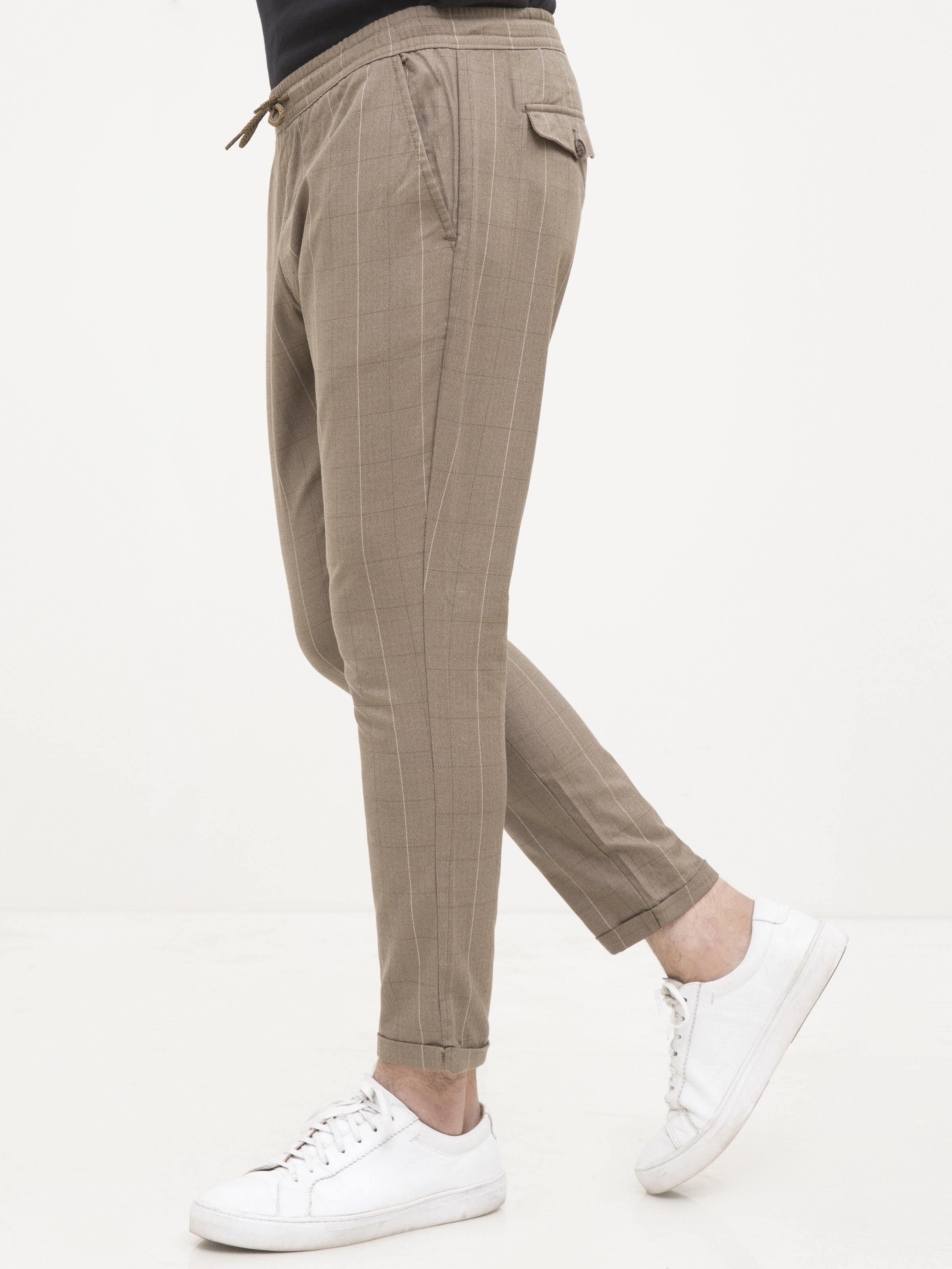 Dark khaki casual trousers with cuffed ankle and side pockets, slim fit