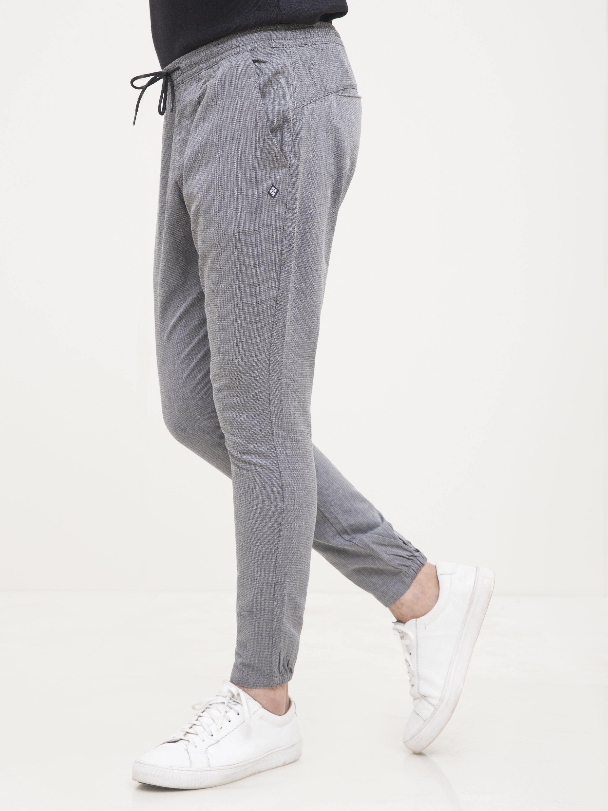 Self-textured casual trousers, light gray, drawstring waist and tapered leg