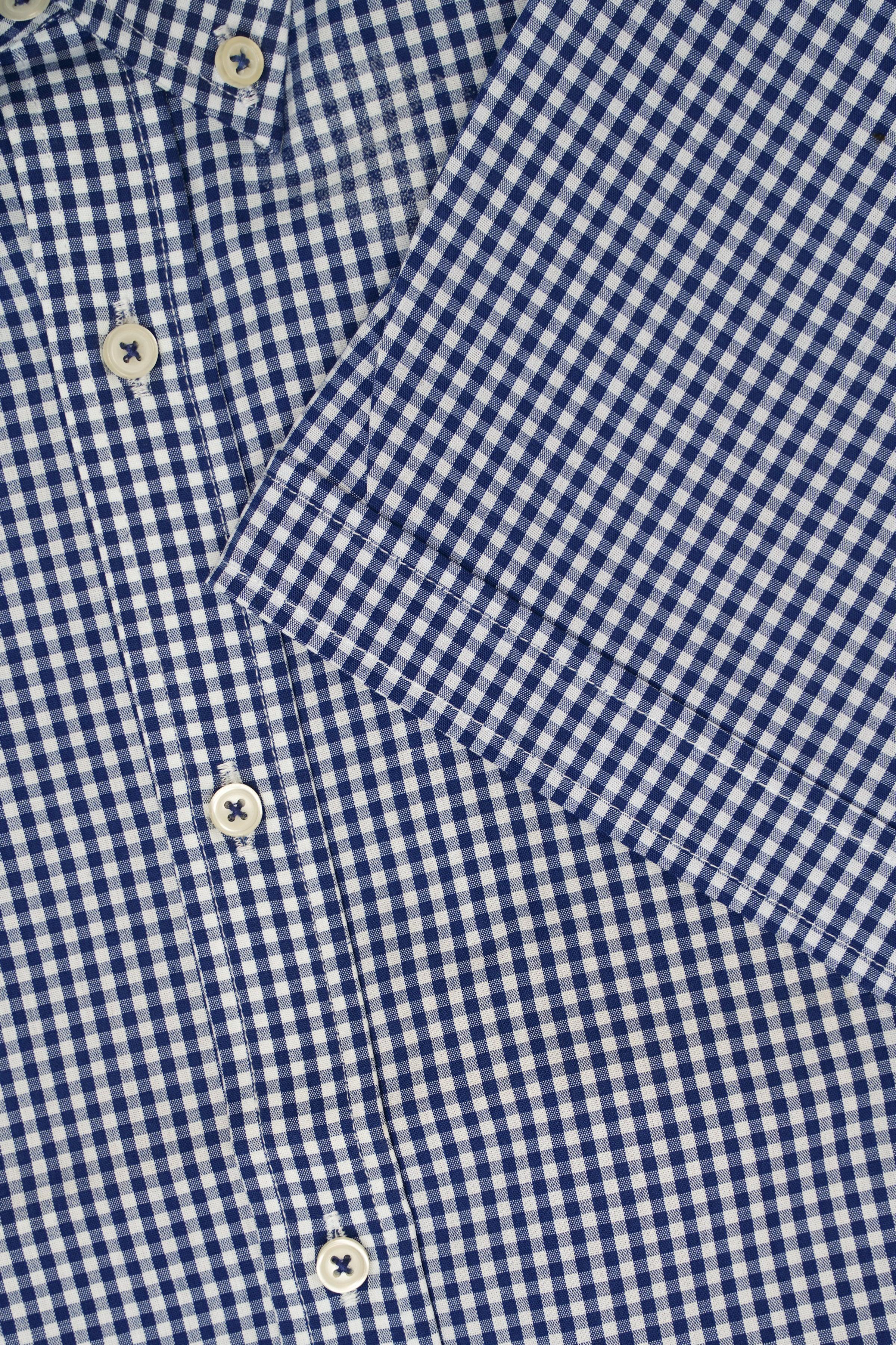 Navy and white check half-sleeve shirt with button placket and cuff