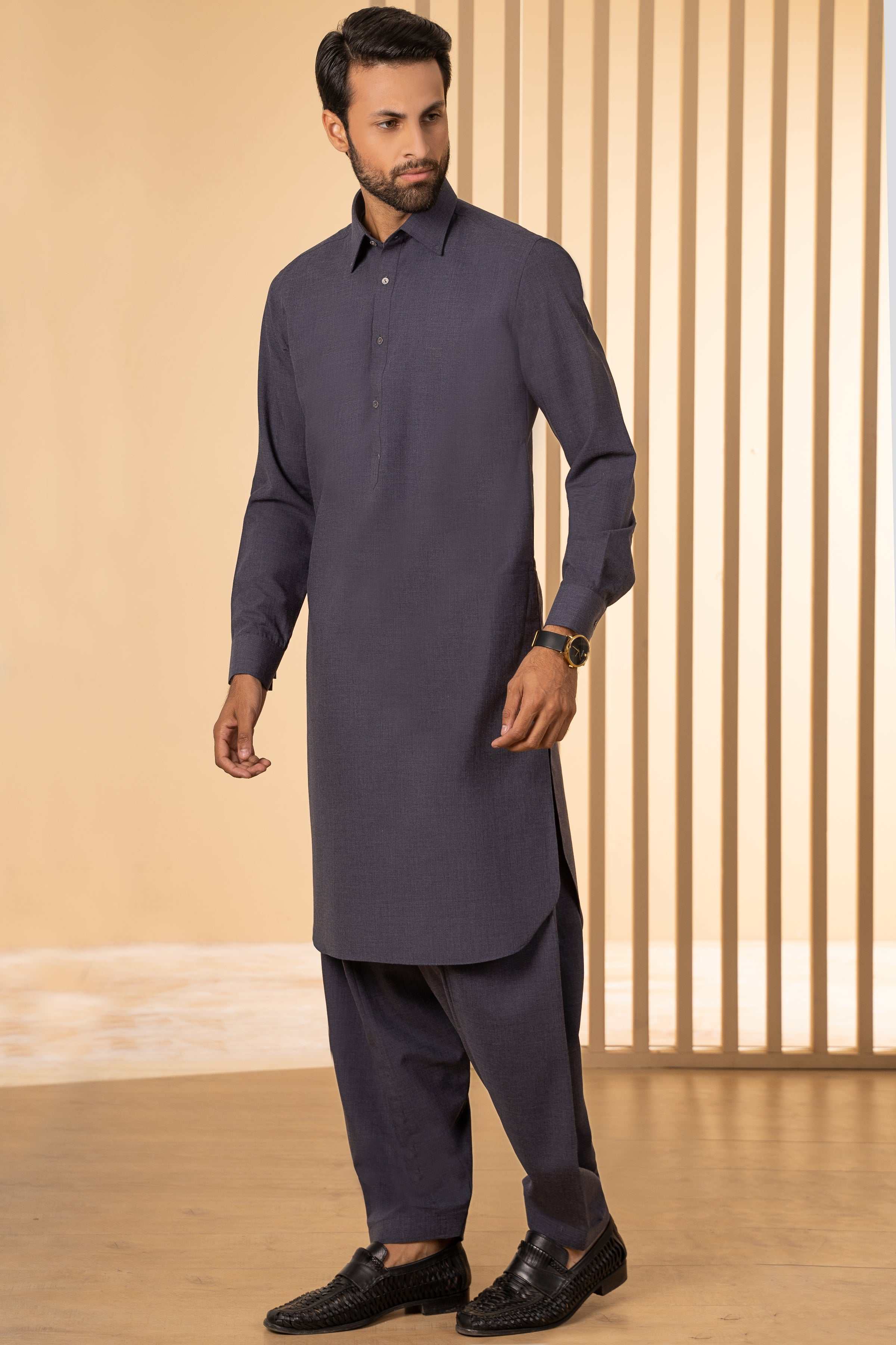 Men's dark blue melange shalwar kameez, front view with long tunic and loose trousers