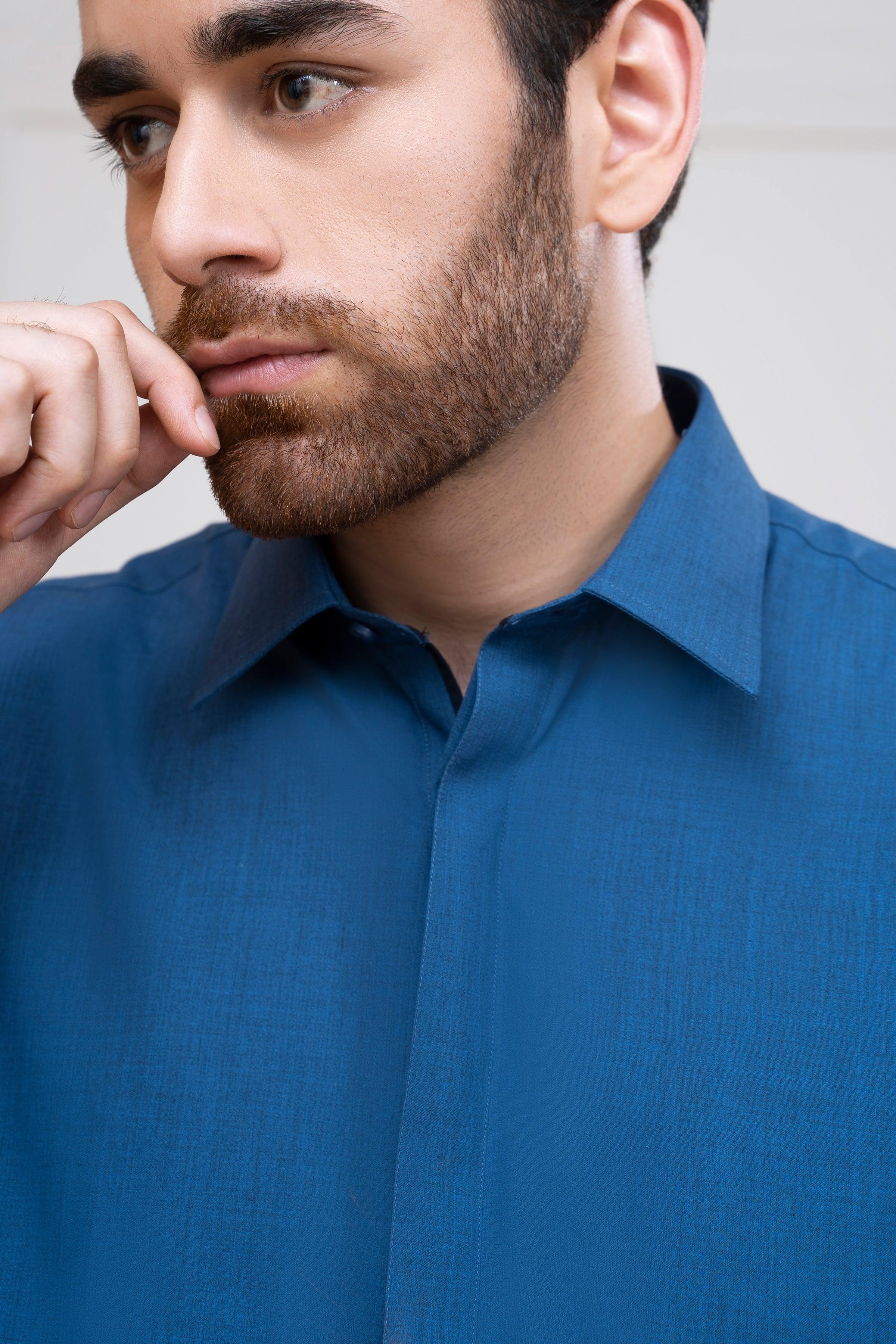 Blue shalwar kameez close-up of stand collar and button placket