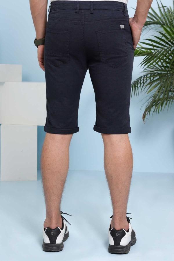Navy chino-style shorts, back view, cuffed hem and belt loops