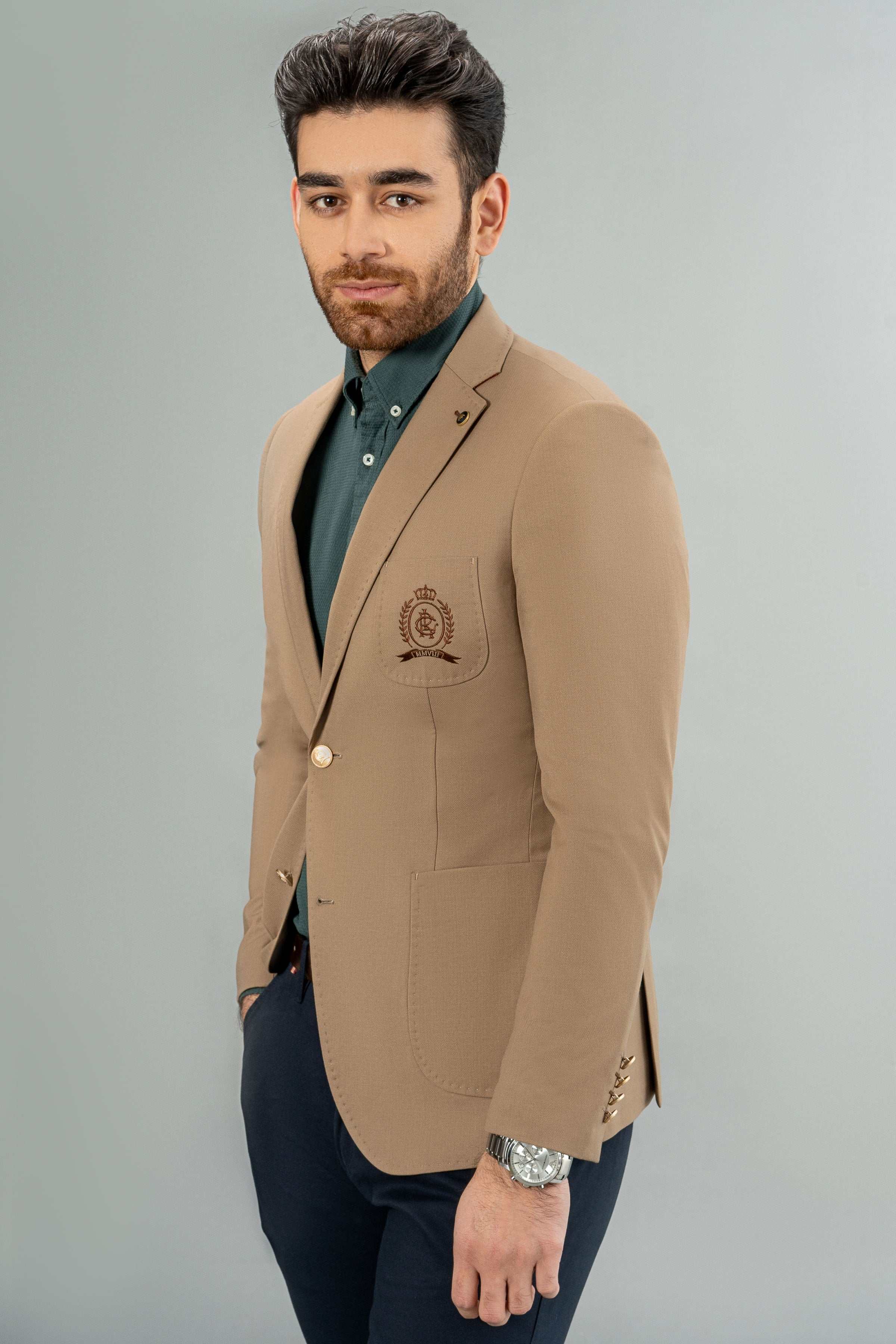 Khaki casual coat with sleeve crest pocket and single-button front