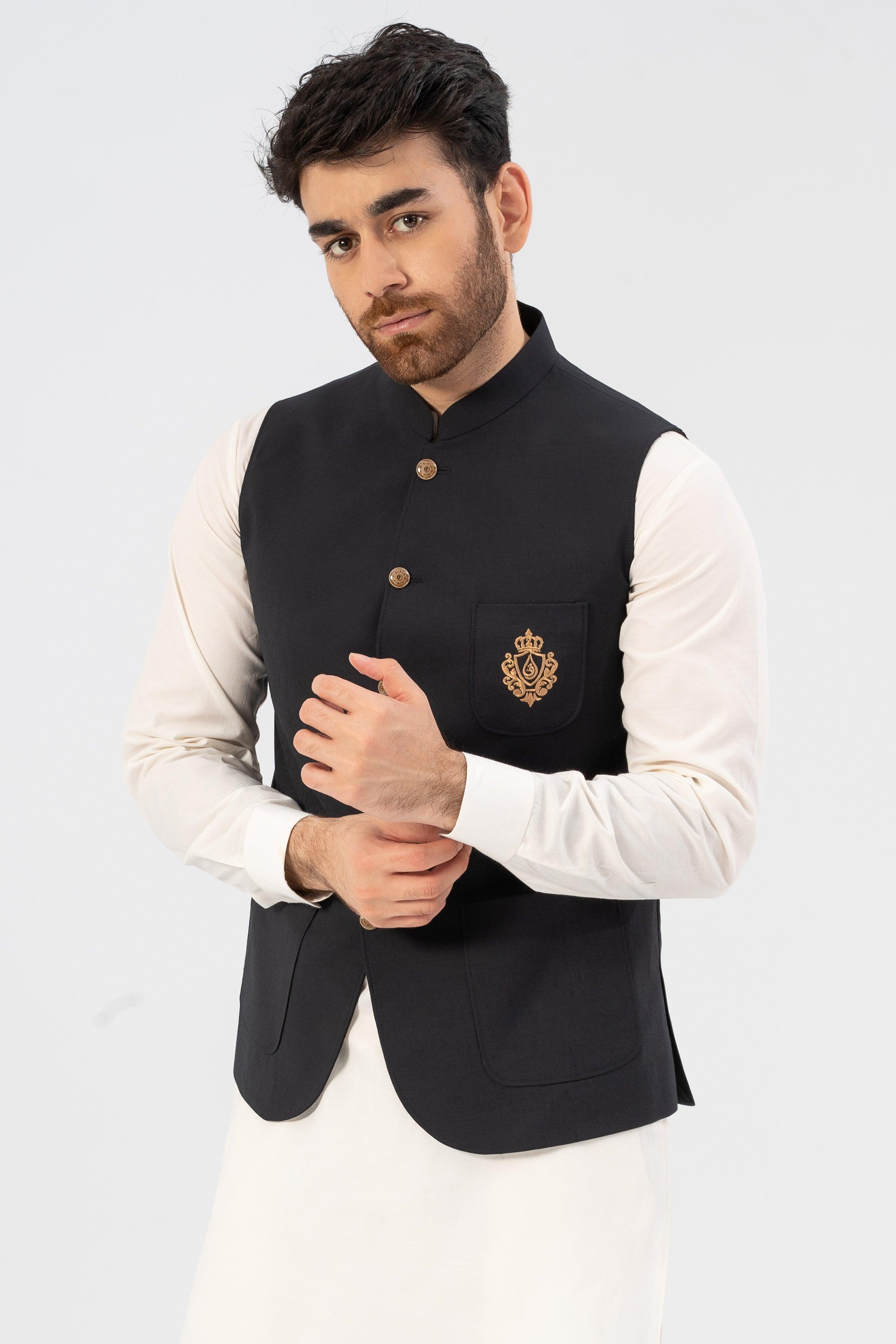 Black waistcoat with stand collar, gold buttons, and embroidered chest badge