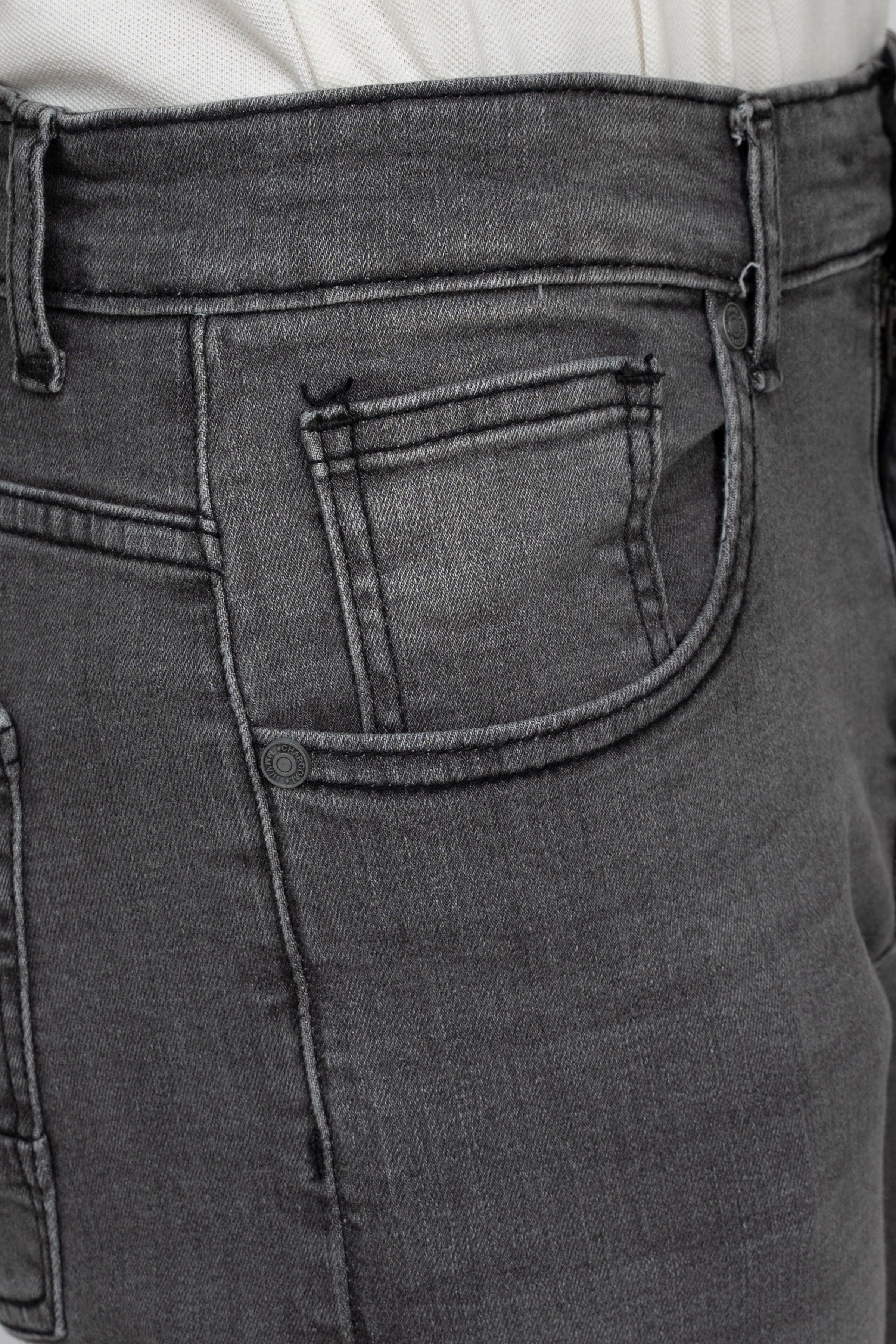 Grey stone-wash skinny jeans close-up of back pocket with stitched detail
