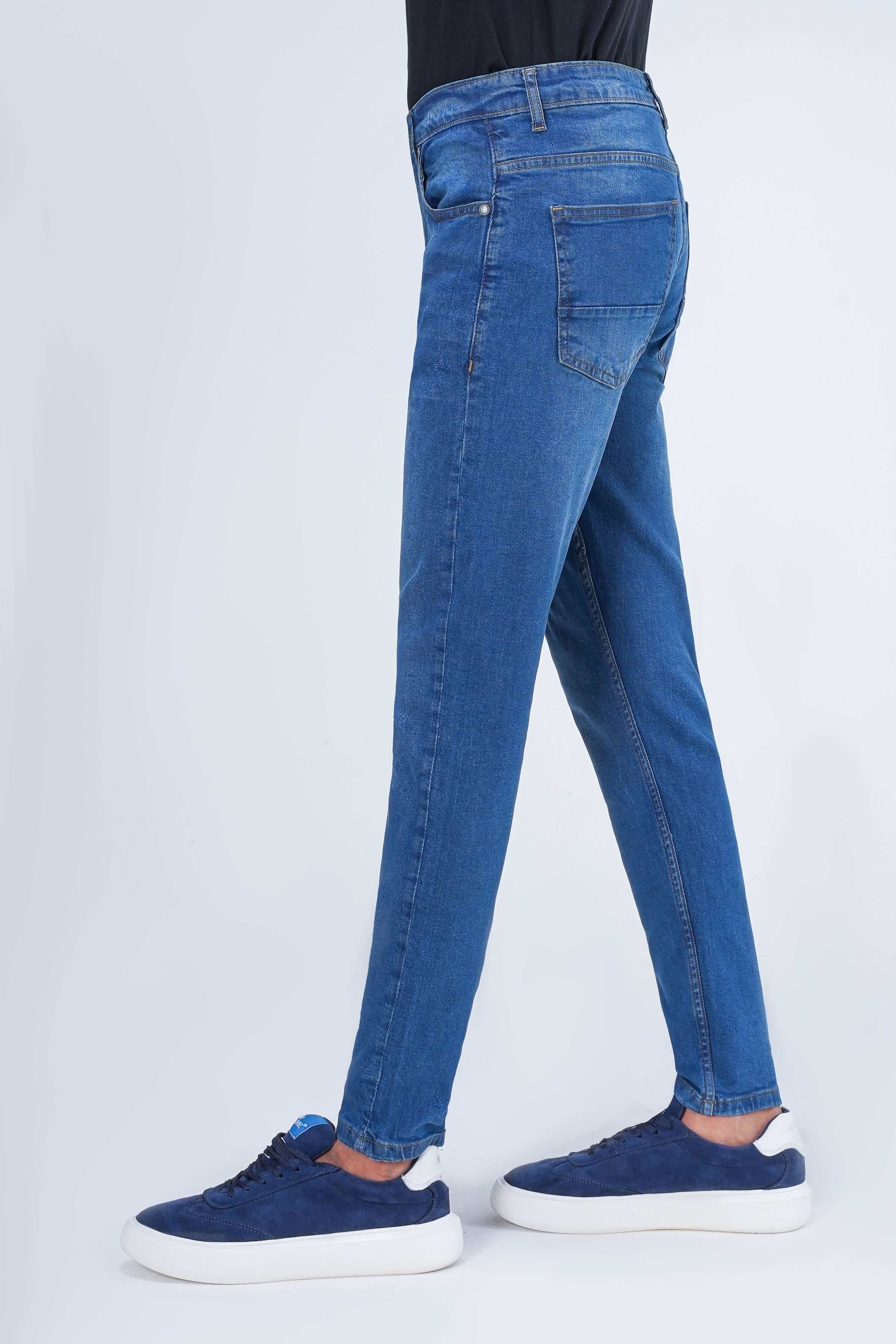 Mid-blue skinny-fit denim jeans with zip fly and five-pocket design