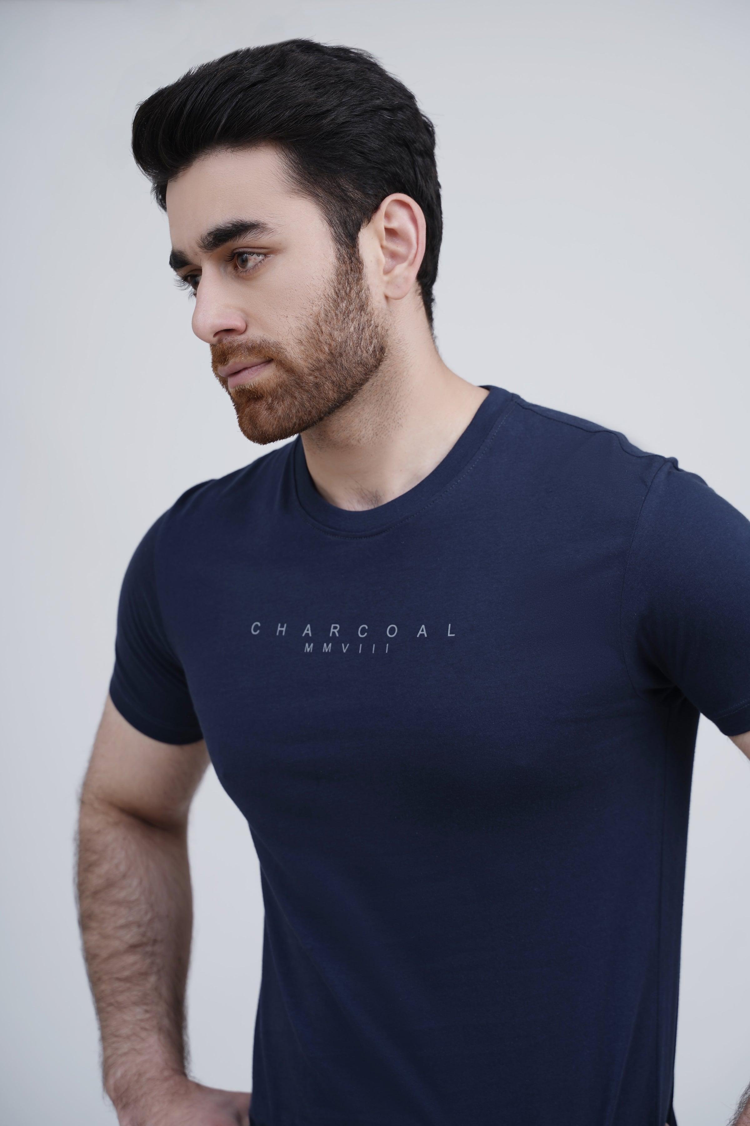 Men's navy crewneck sleep T-shirt close-up with small chest logo