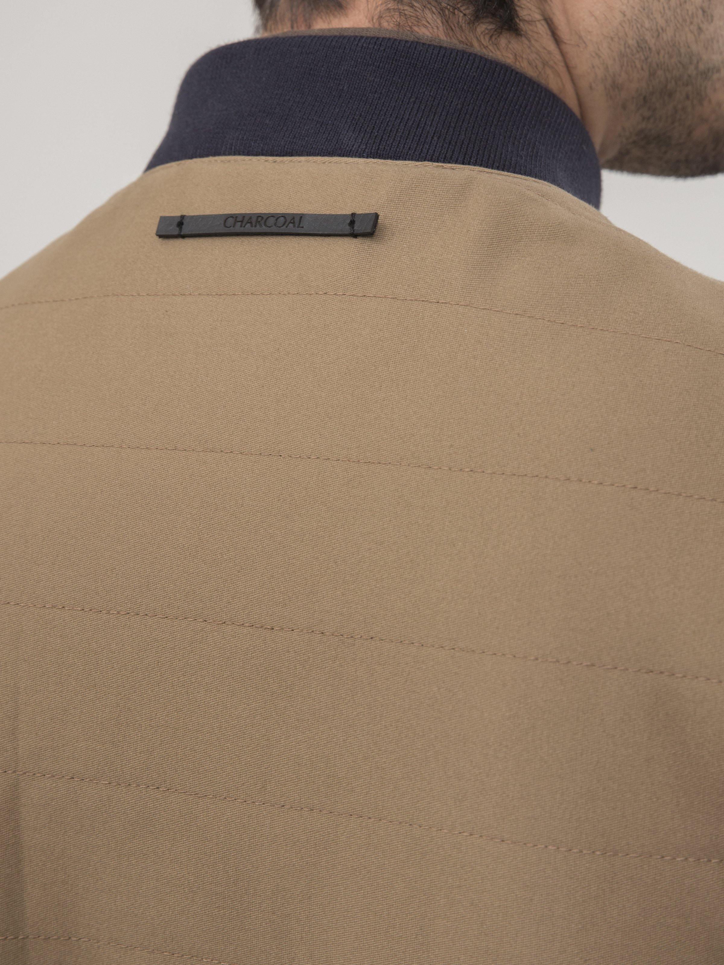 SLEEVELESS QUILTED DARK KHAKI JACKET at Charcoal Clothing