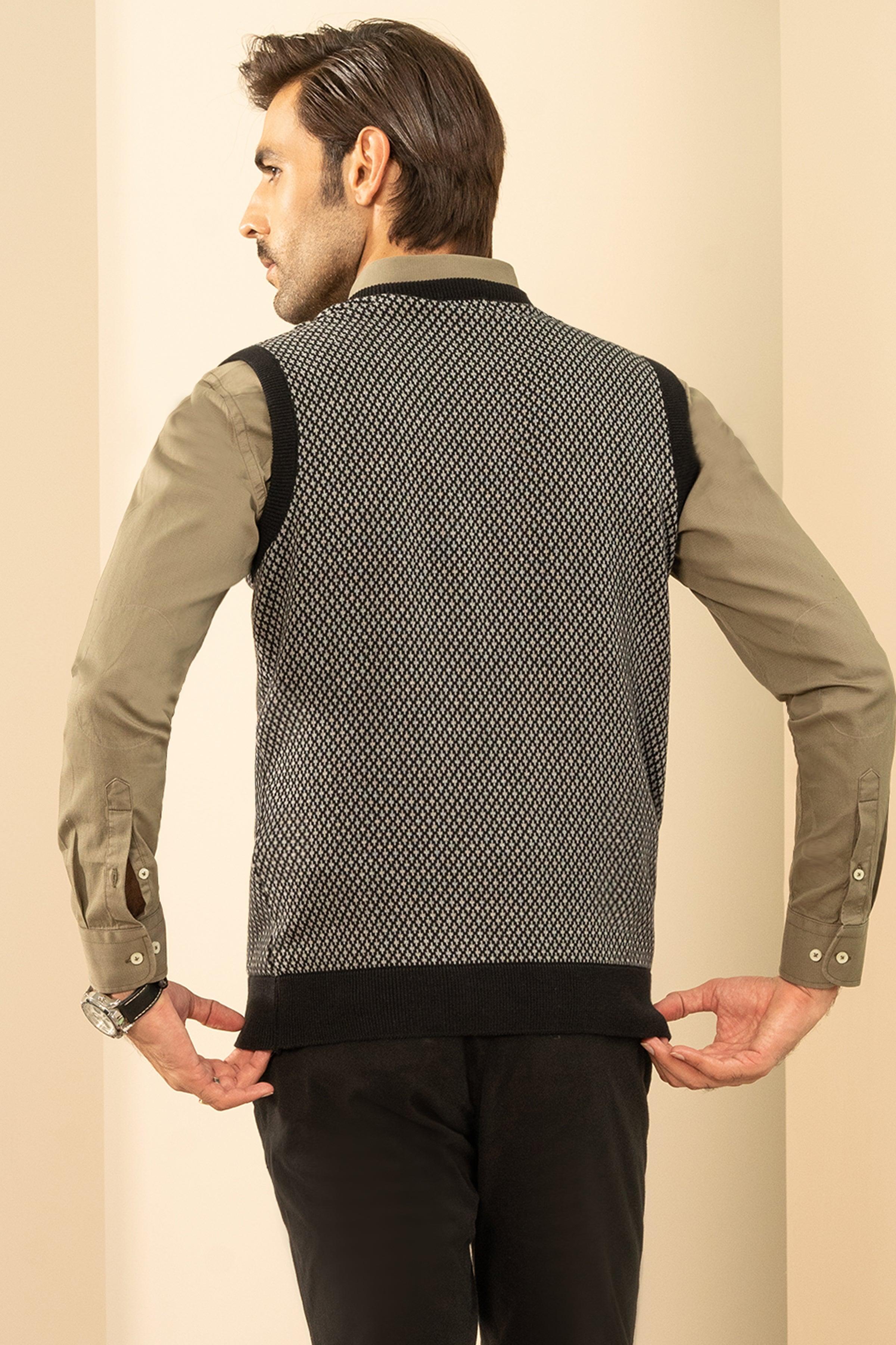 Back view of sleeveless V-neck sweater vest, dark gray knit with black ribbed hem.