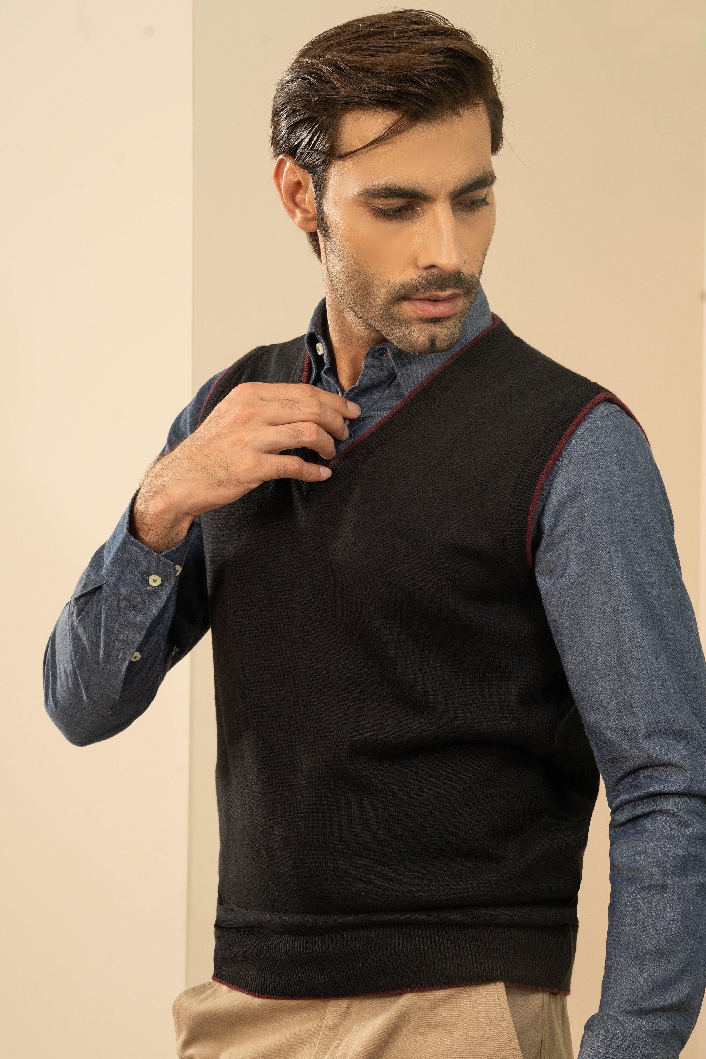 Men's black sleeveless sweater vest with maroon-edged V-neck and ribbed hem