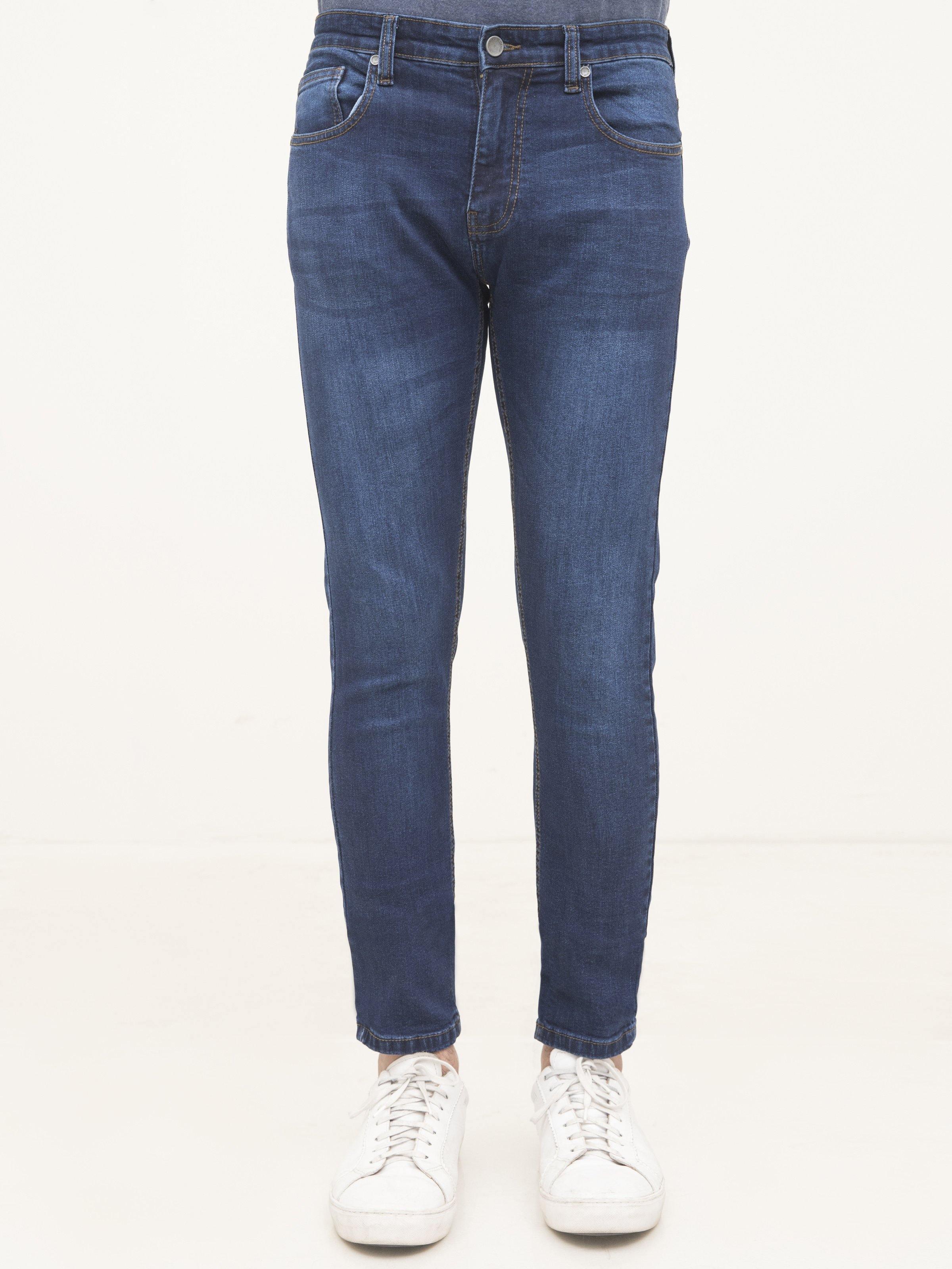 Dark blue slim-fit jeans, front view, straight tapered legs, five-pocket styling