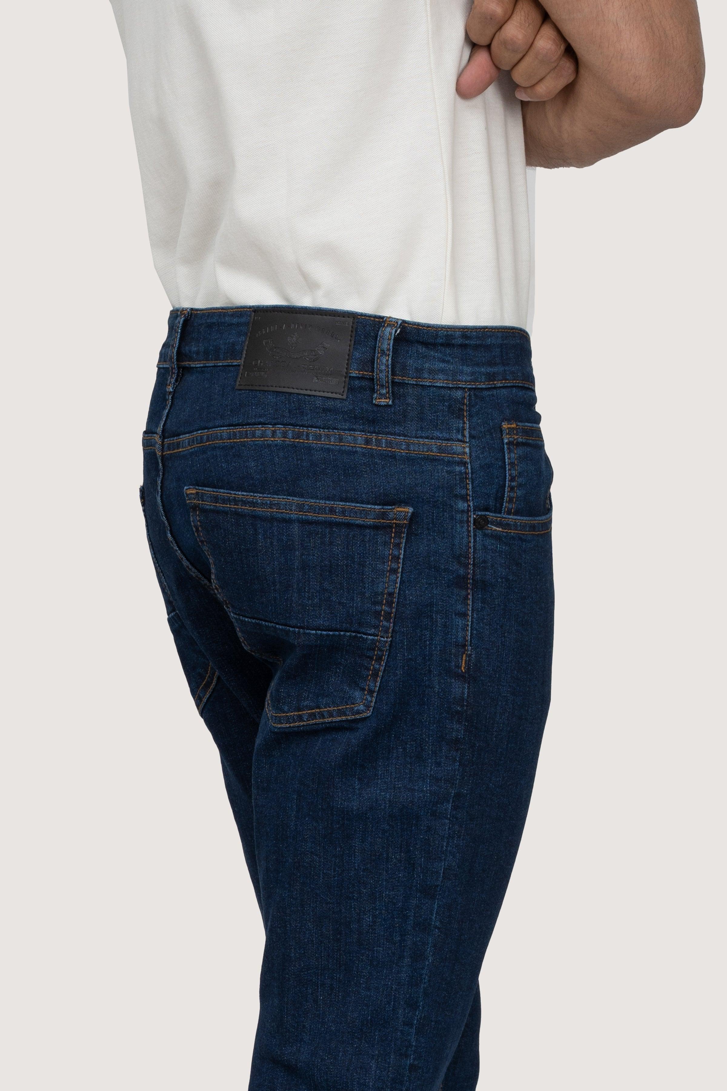 Dark blue slim-leg denim jeans with belt loops and back yoke detail