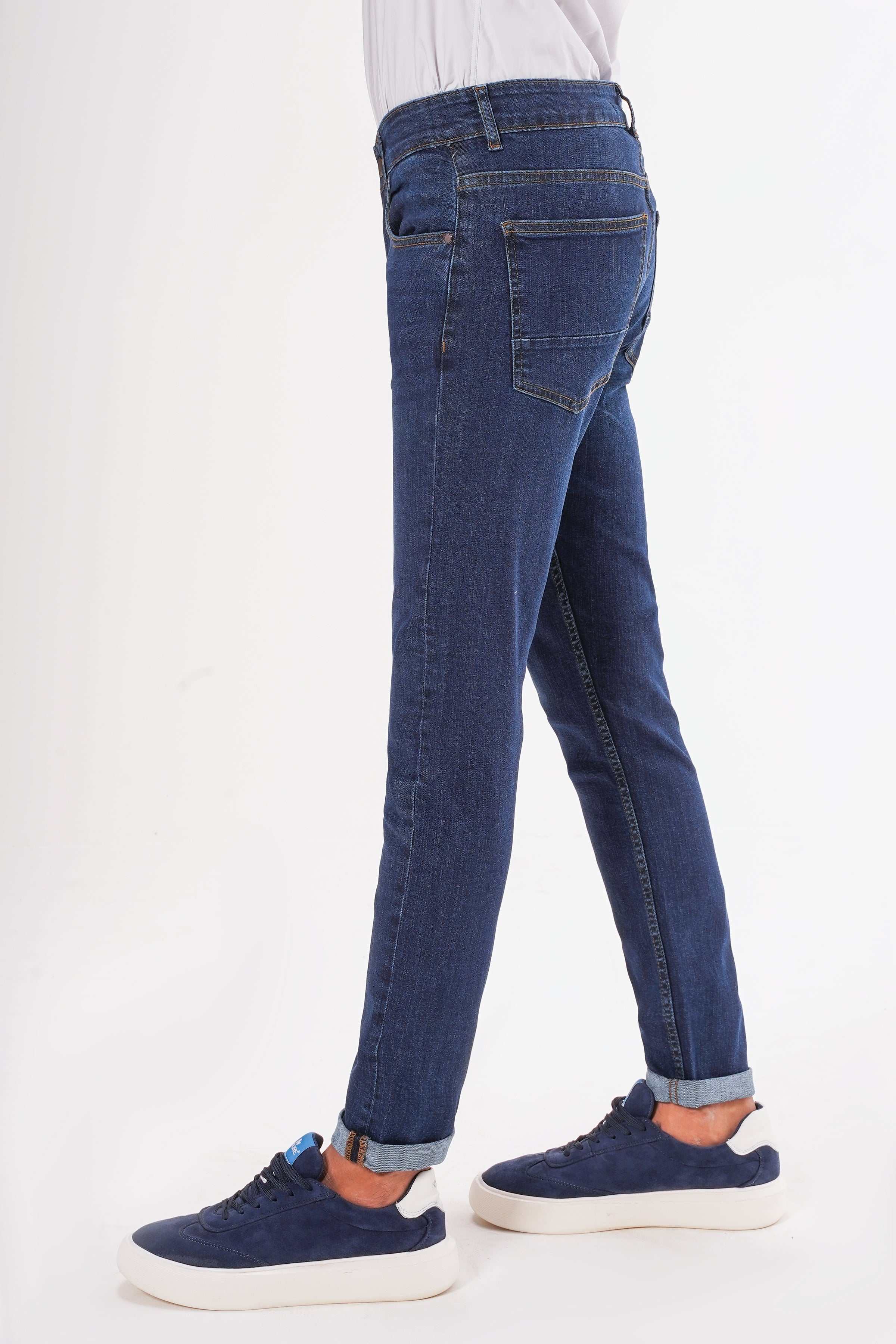 Dark blue slim-leg jeans with belt loops, back and front pockets, and straight slim fit