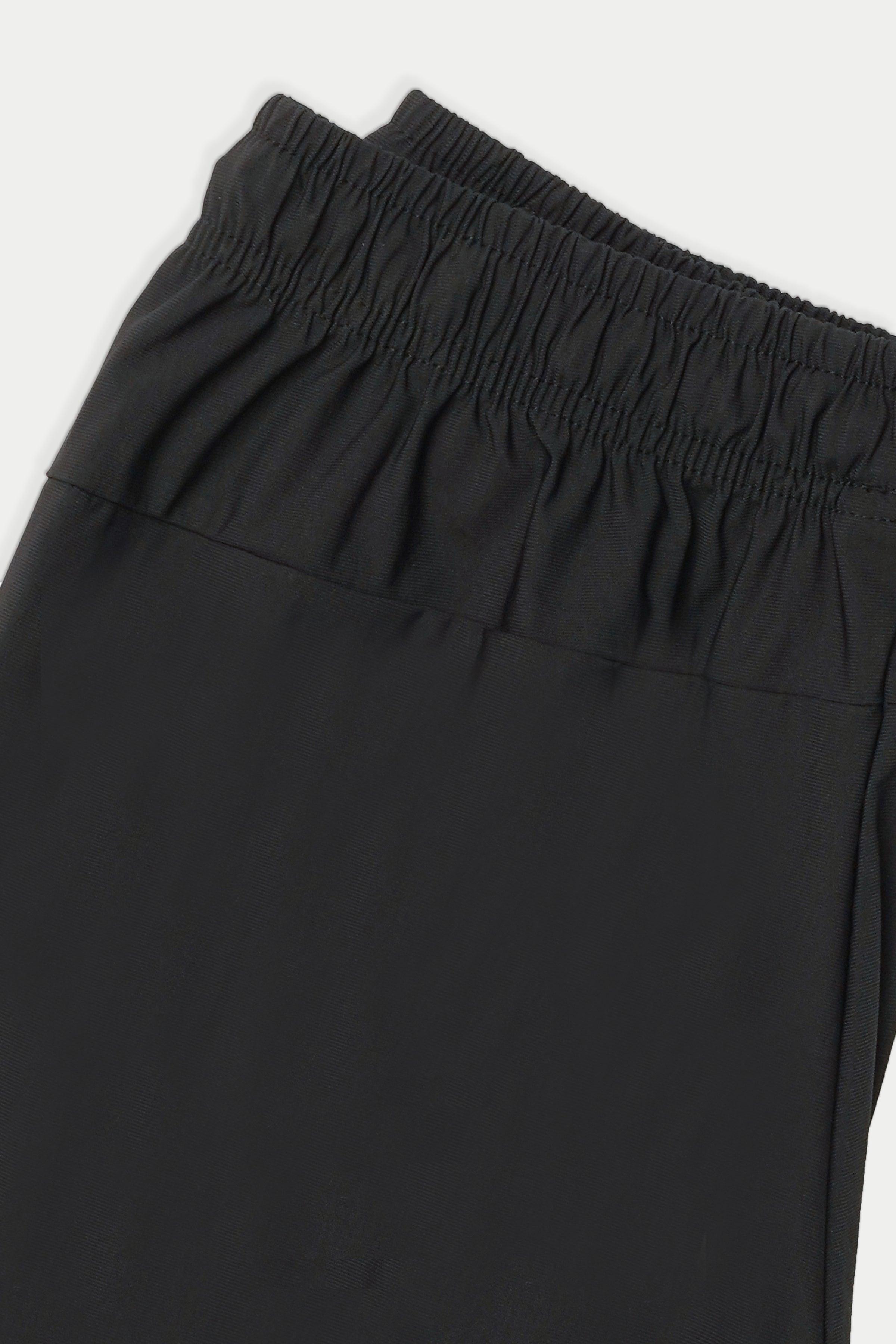 Black sports trouser elastic waistband with gathered drawstring area