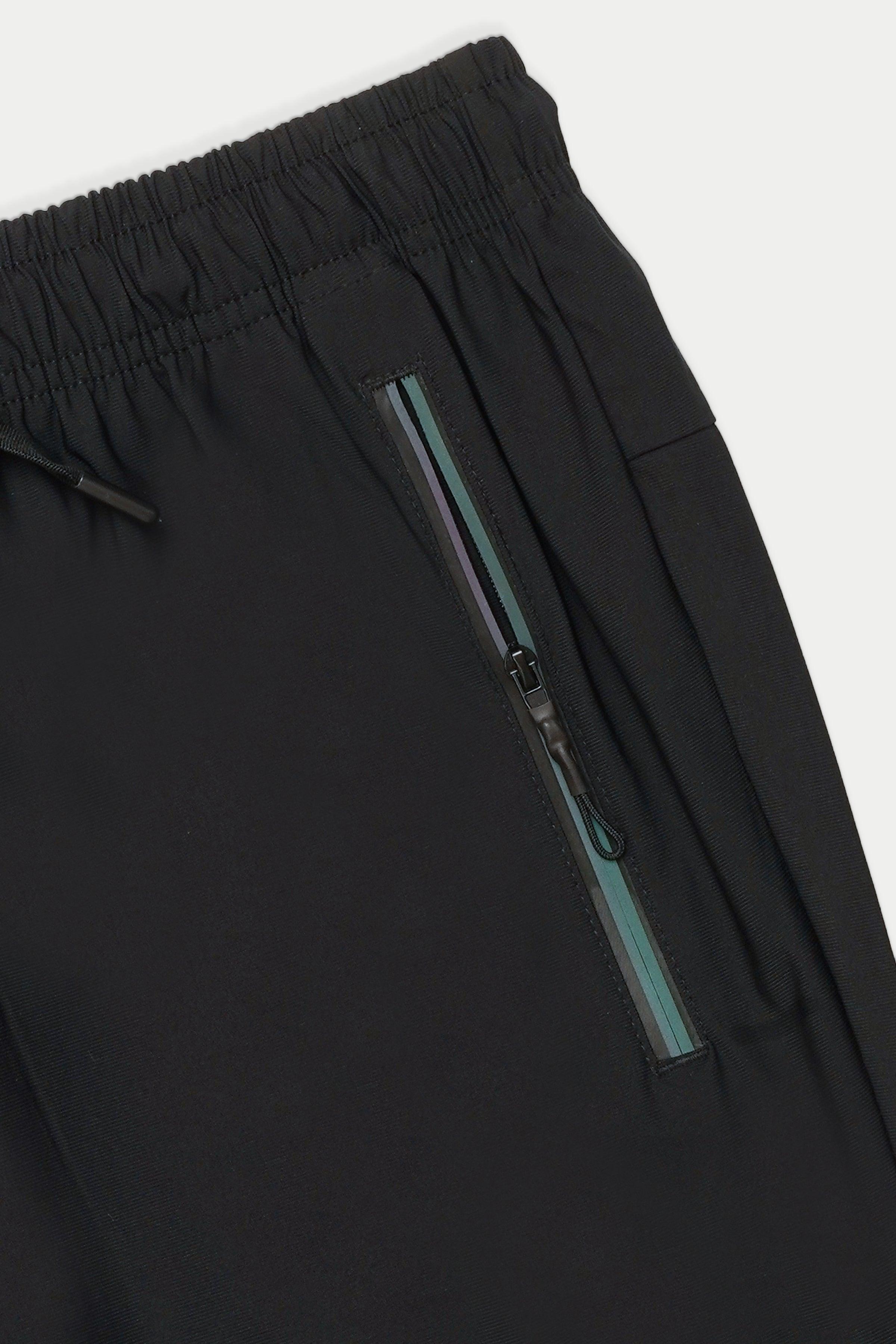 Black sports trouser side zip pocket with teal stripe detail