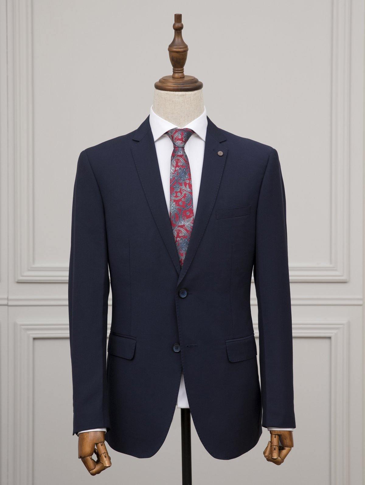 Navy plain suit jacket with notch lapels, two-button closure, and flap pockets