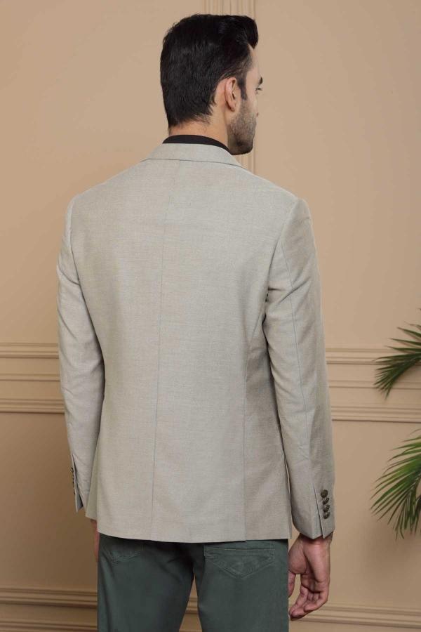 Back view of slim-fit light brown blazer with single vent and long sleeves