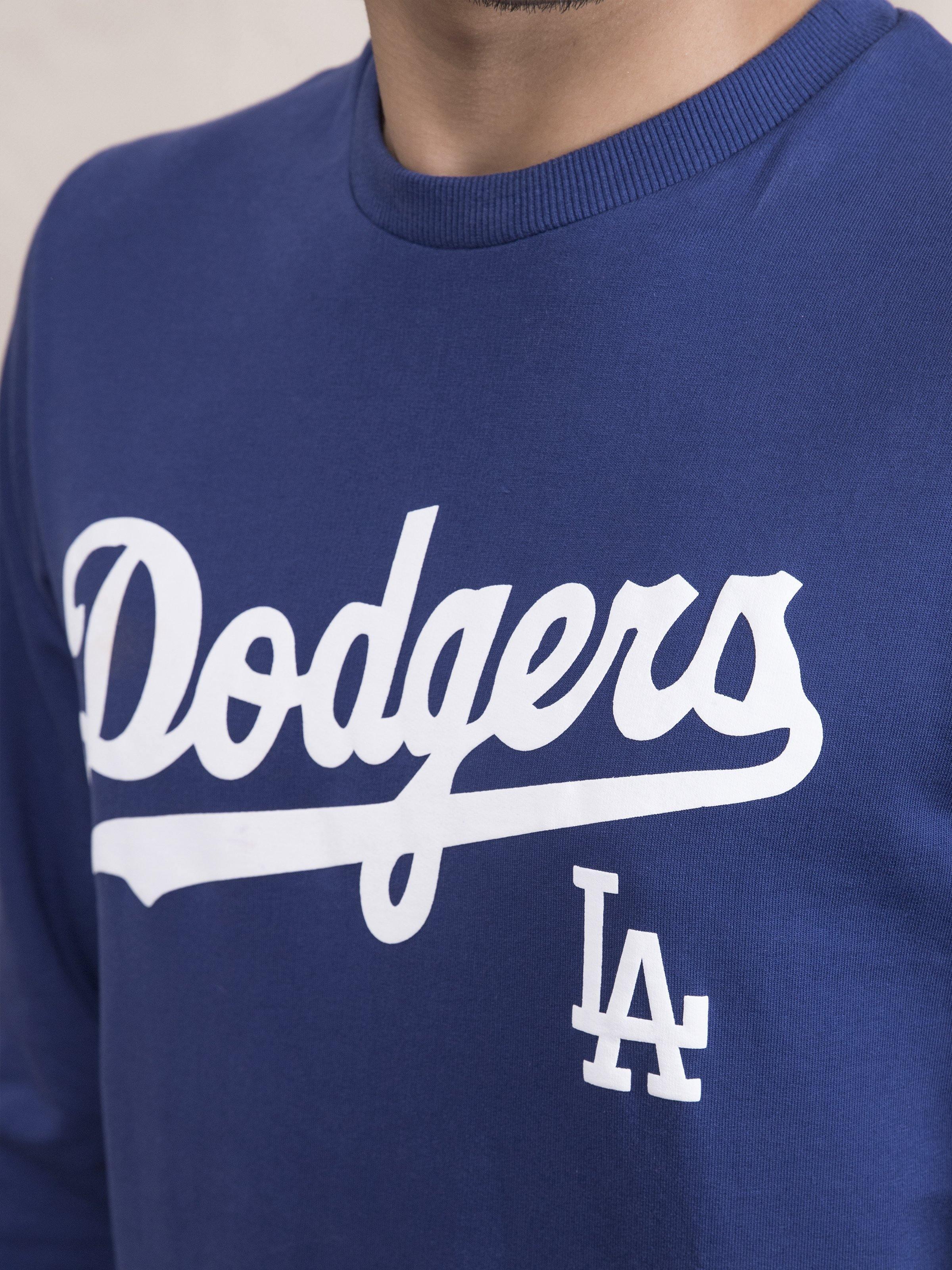 Indigo crewneck sweatshirt with large white Dodgers script and LA logo
