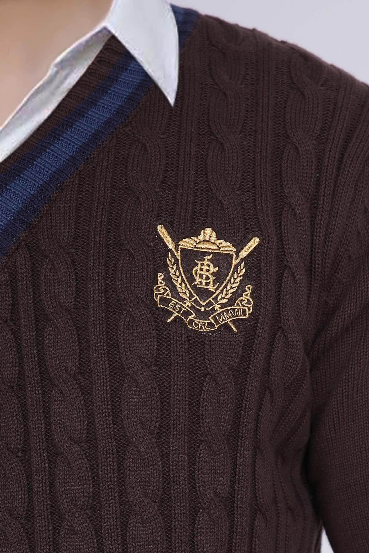 Brown cable-knit V-neck sweater with embroidered crest on chest and long sleeves