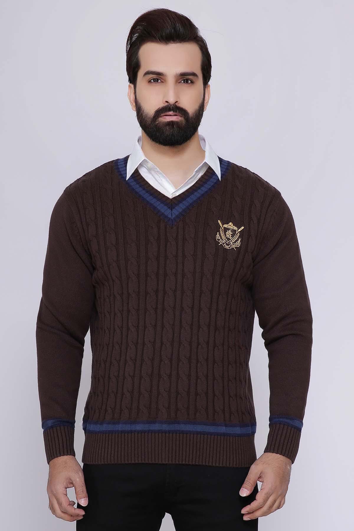 Brown V-neck sweater with navy trim at collar, hem, and cuffs