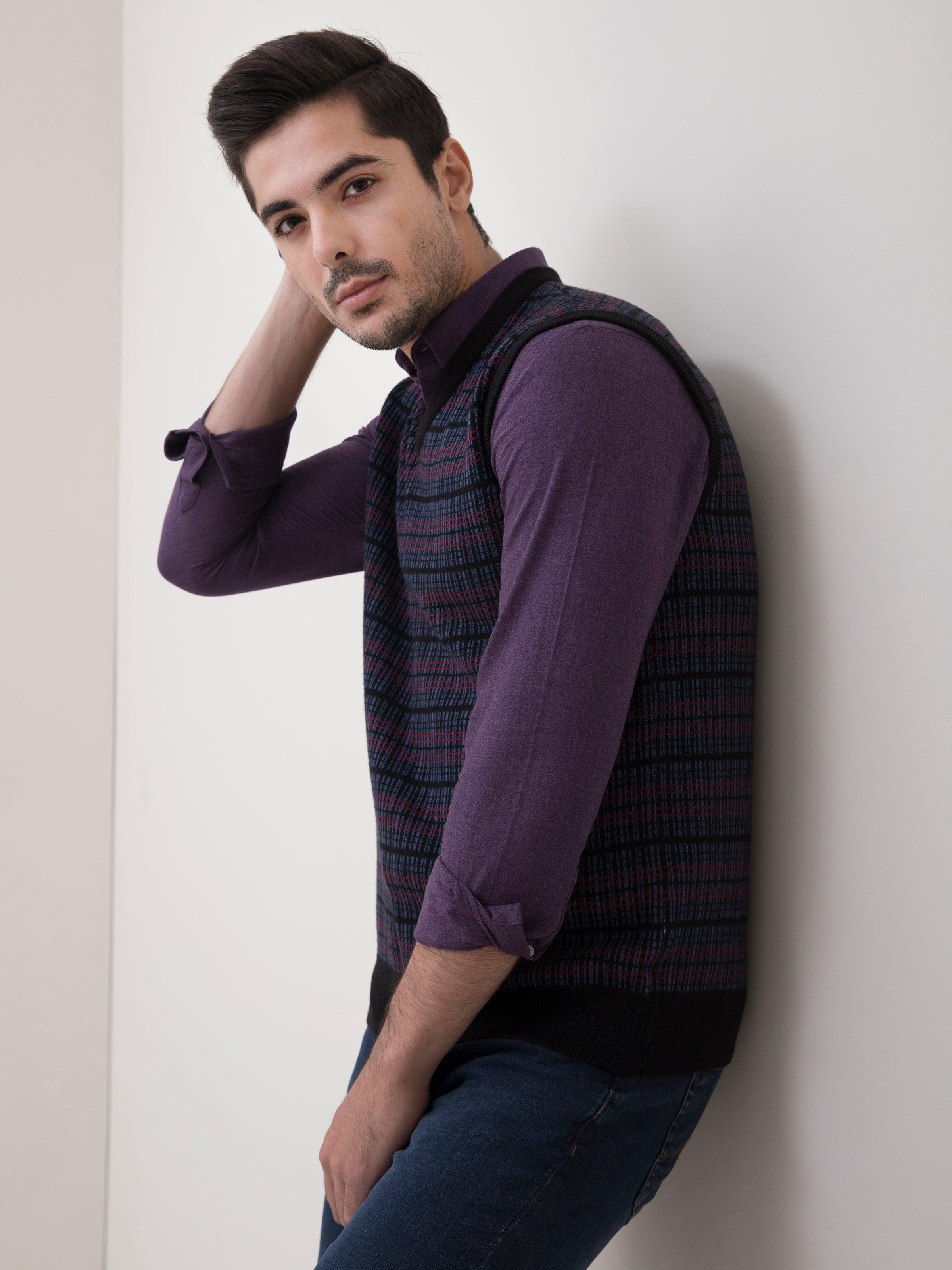 Side view of striped knit V-neck sweater vest, sleeveless with ribbed collar trim