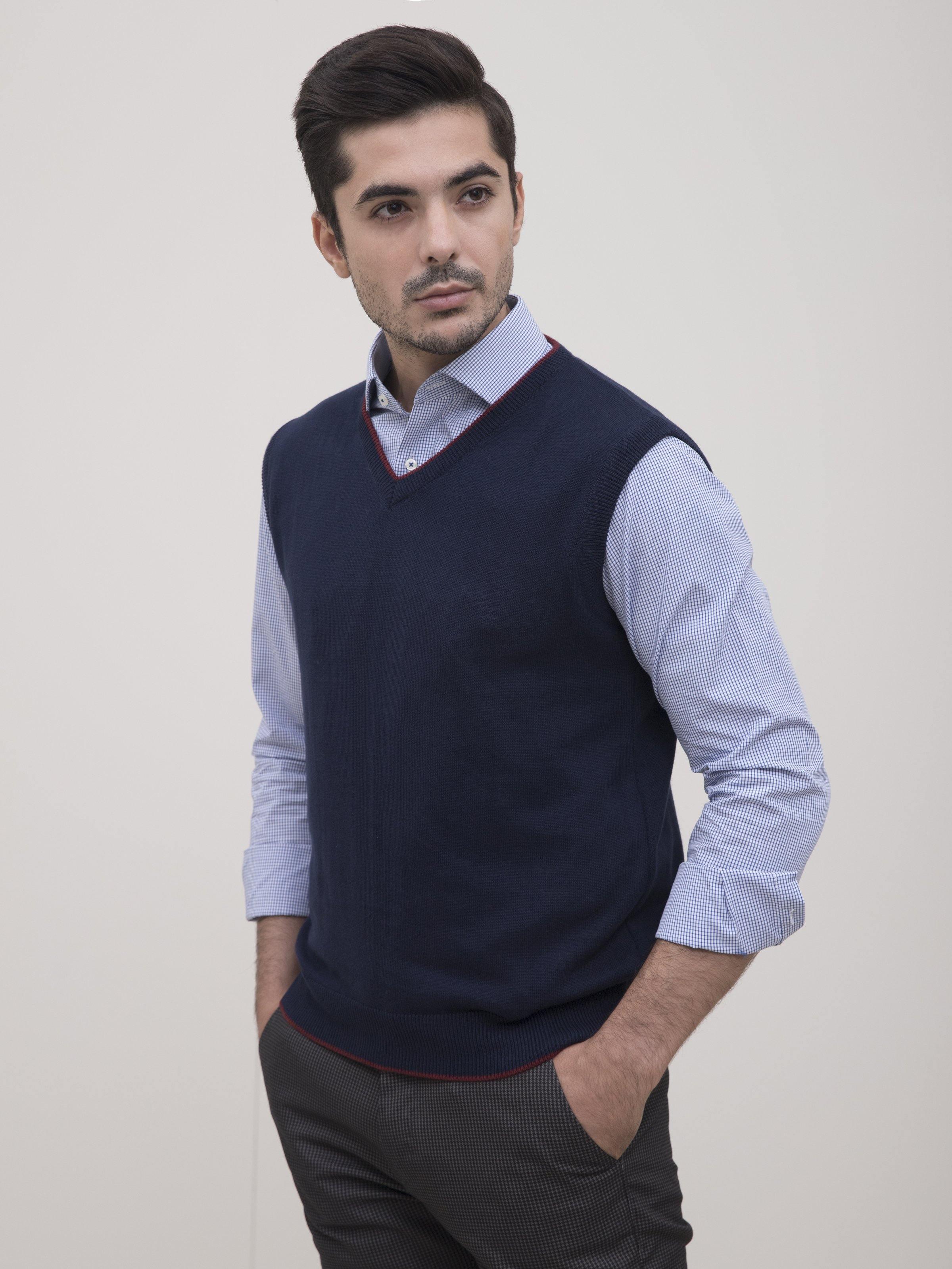 Navy V-neck sleeveless sweater vest with red trim