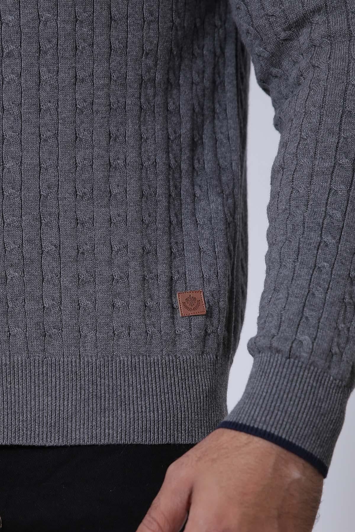 Grey zip sweater with ribbed cuffs and small leather patch