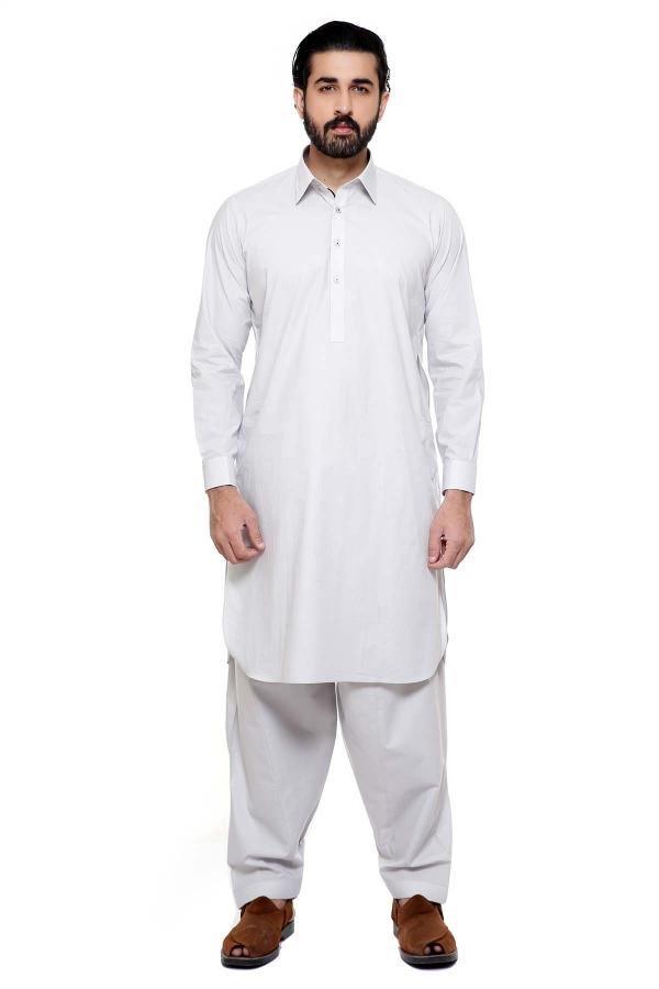 Long tunic with collar and button placket, loose trousers, front view