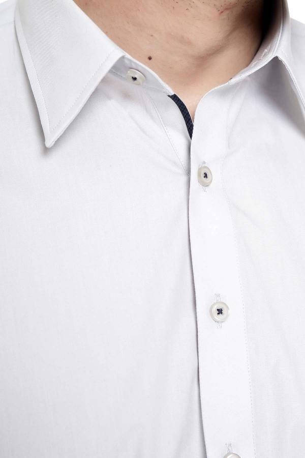 Collar and button placket detail on long tunic, light fabric