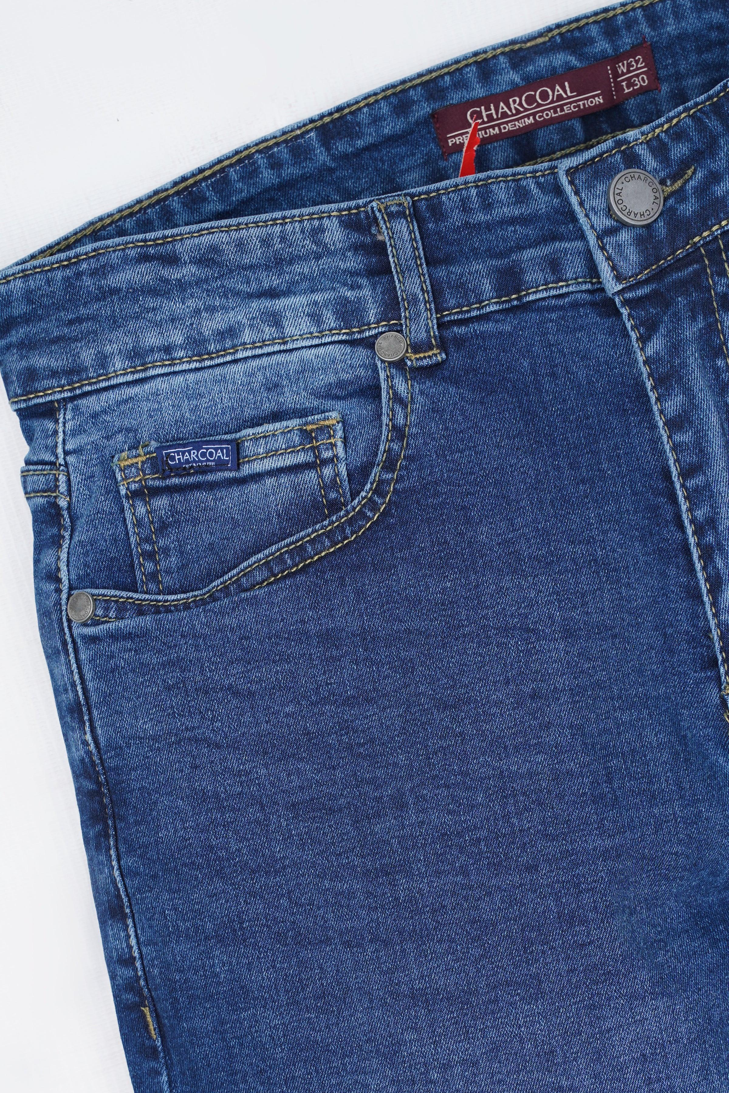 Mid blue denim jeans front pockets and coin pocket with logo patch