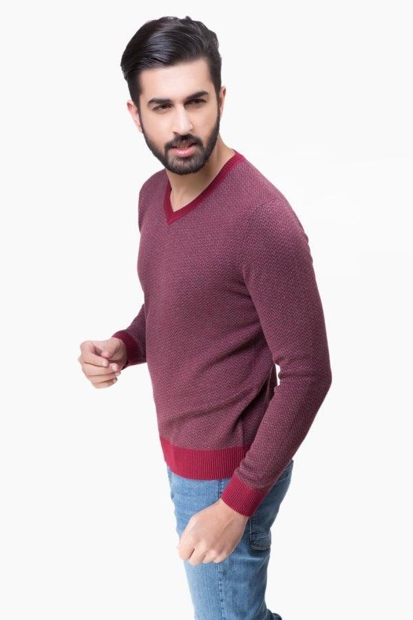 Maroon V-neck long-sleeve sweater with ribbed hem and cuffs, side view