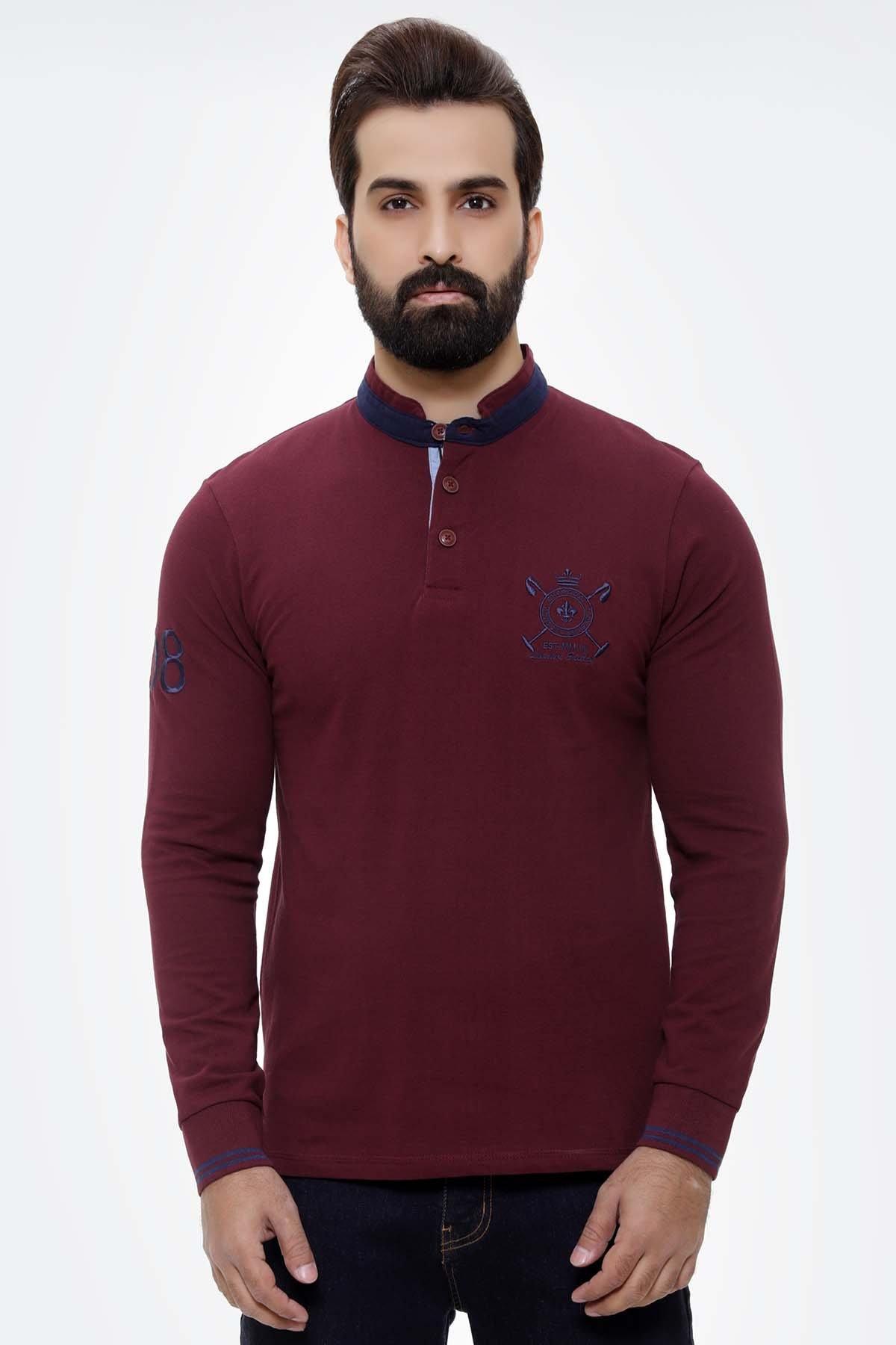 Maroon long-sleeve henley T-shirt with button placket and chest graphic