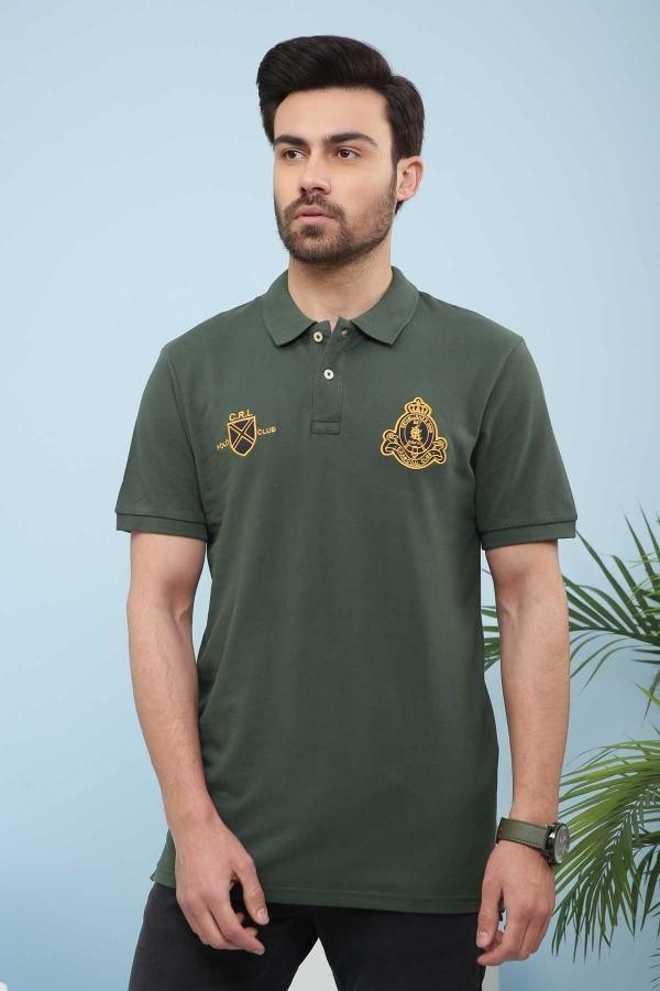 Green polo T-shirt with short sleeves, button placket, and embroidered crest logo
