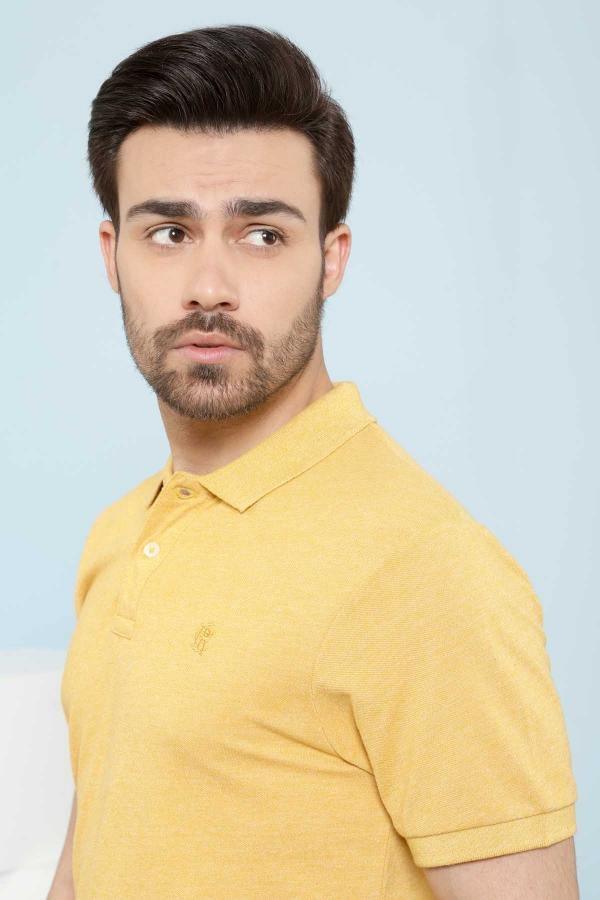 Mustard polo T-shirt, short sleeve with fold-over button collar and chest logo.