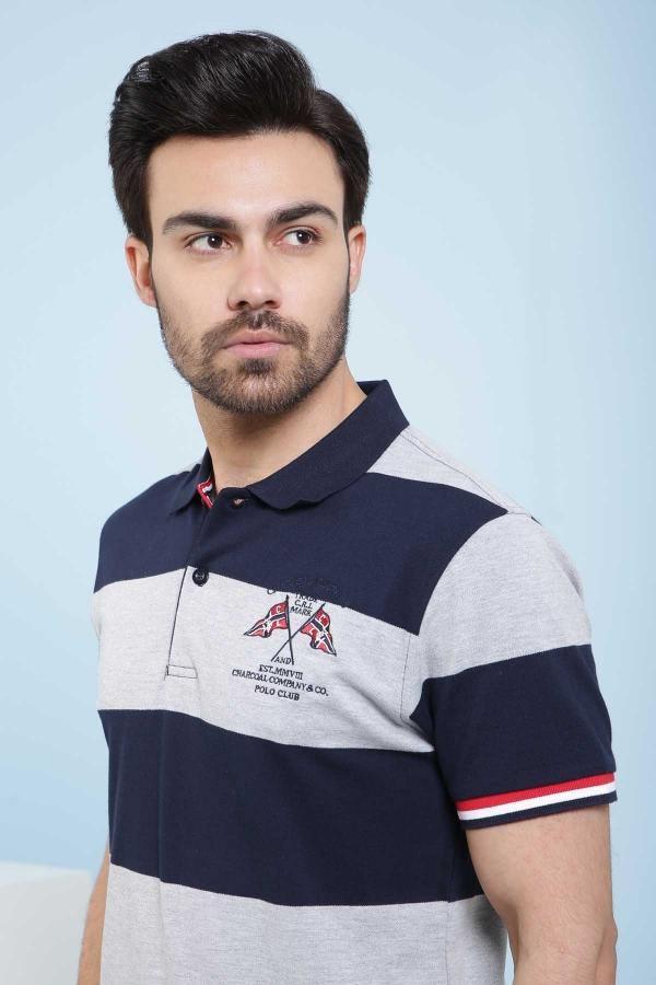 Navy and gray striped polo shirt with red-trim sleeves and chest logo