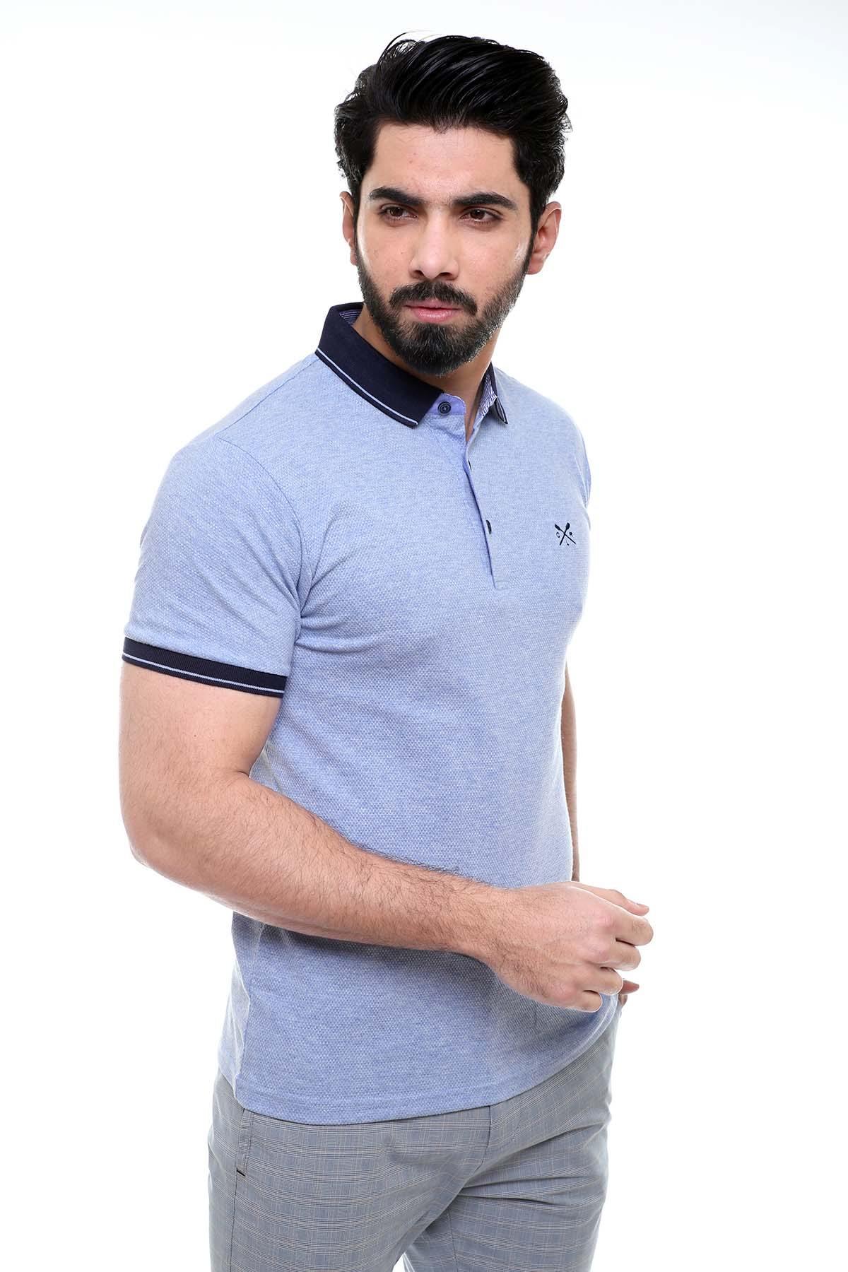 Sky blue polo T-shirt close-up with dark collar trim and chest logo