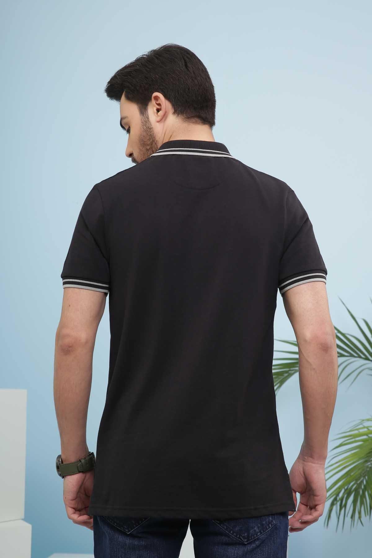 Black polo shirt back view with white striped collar and sleeve cuffs