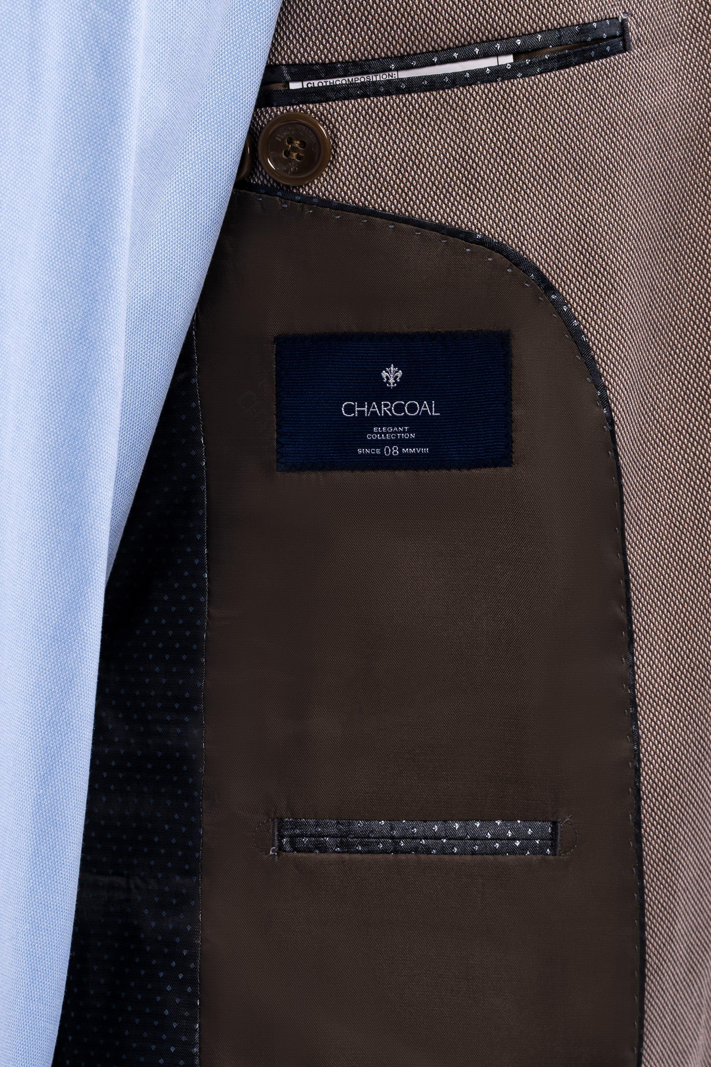 Suit vest interior label reading CHARCOAL with black patterned trim