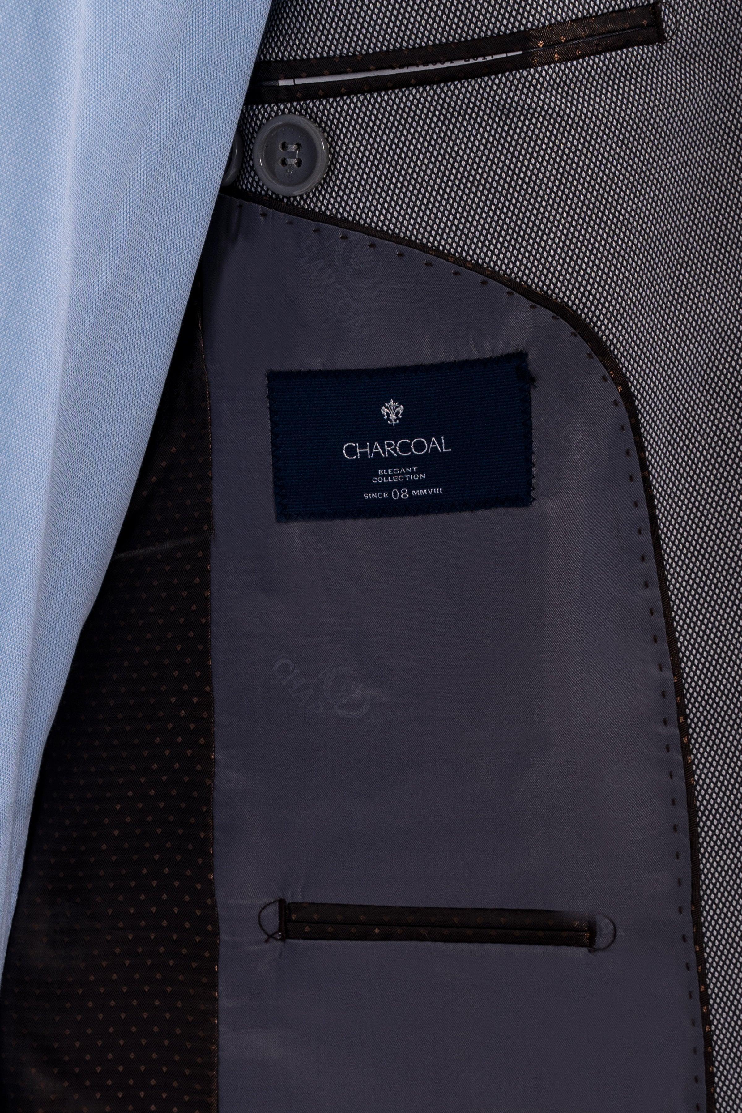 Suit jacket interior with Charcoal label and pocket lining stitching