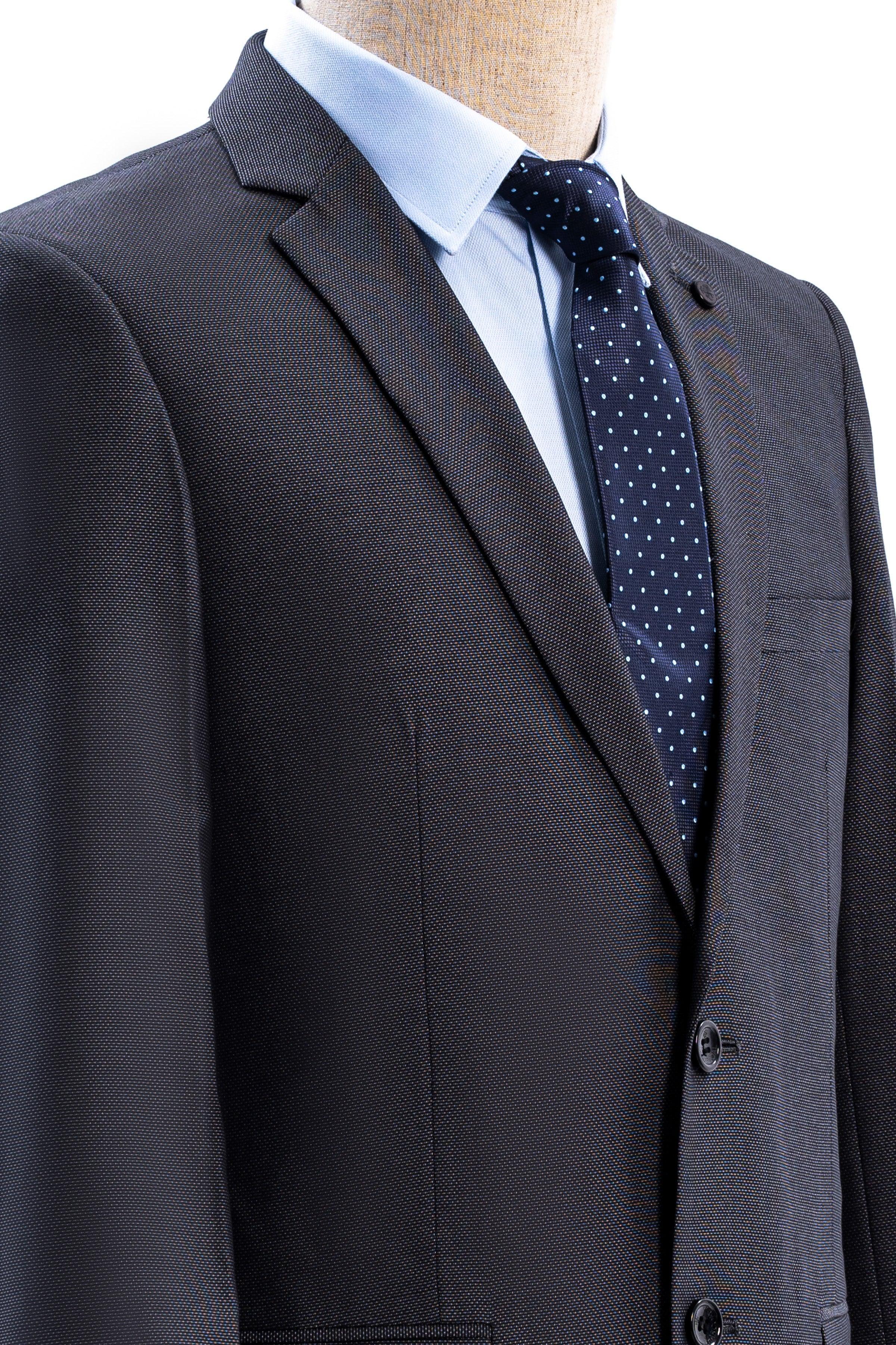Slim fit suit jacket lapel with chest pocket, dark fabric