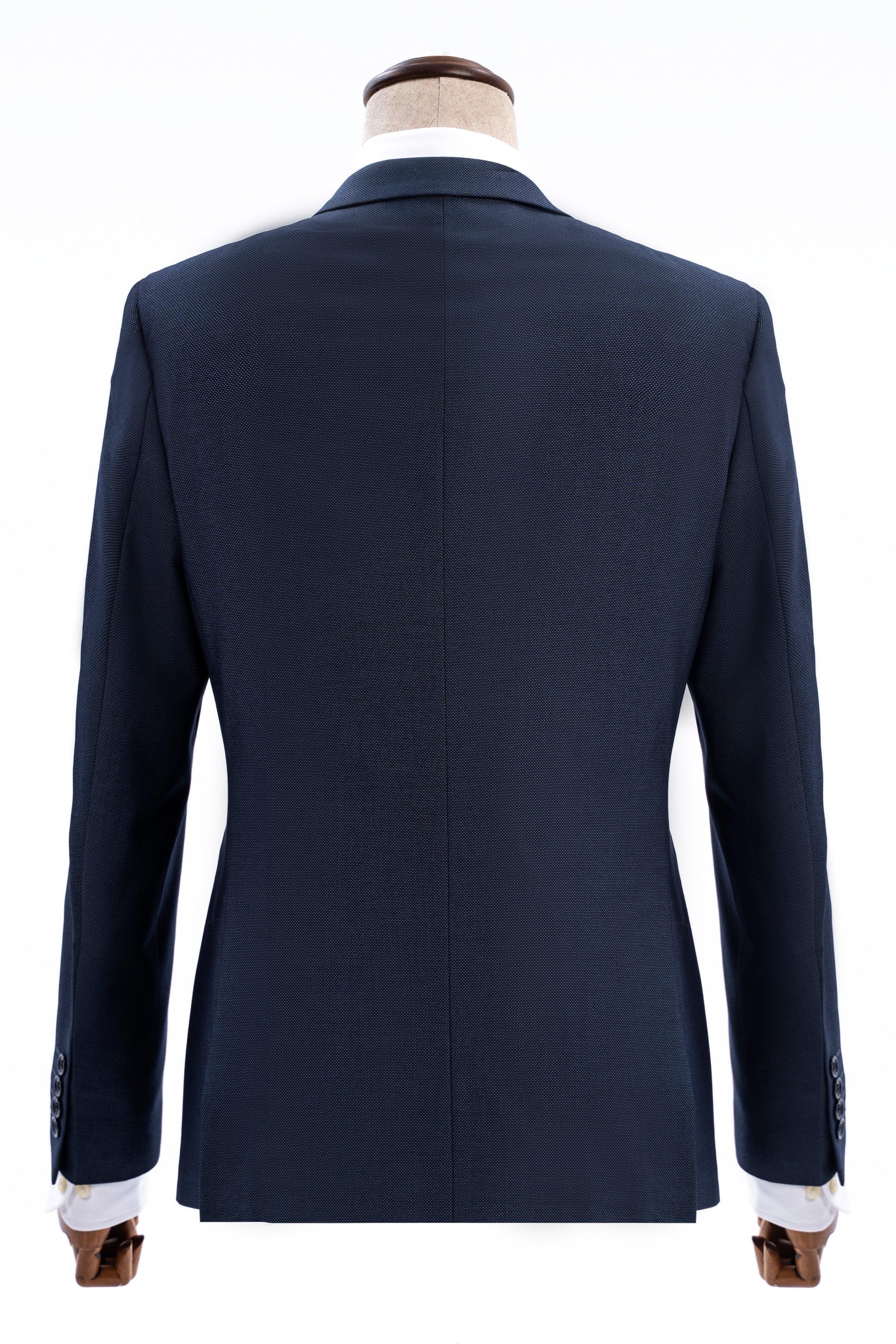 Blue slim-fit suit jacket back view with center seam and vented hem