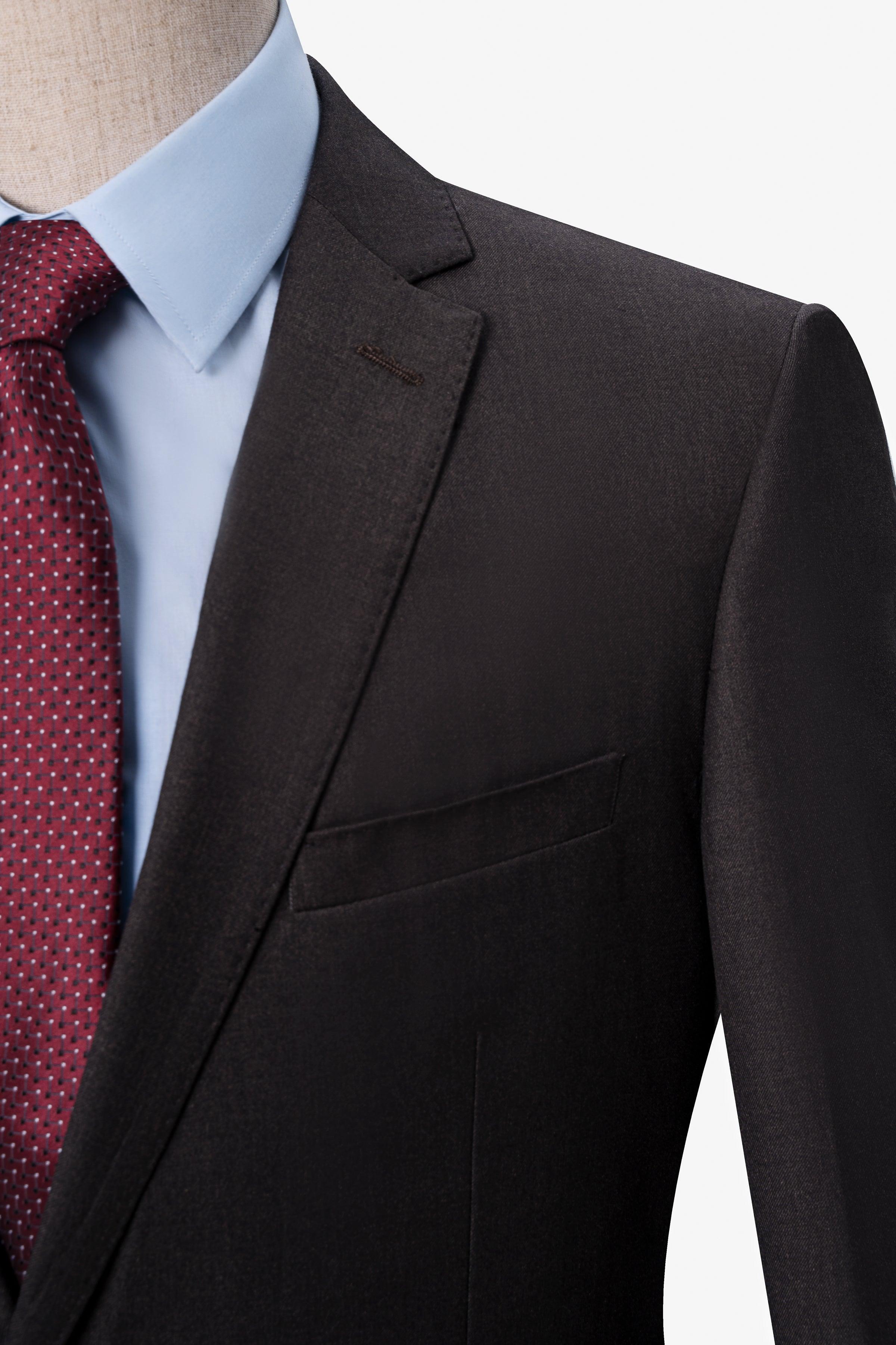 Suit jacket shoulder and lapel, dark brown, with red dotted tie