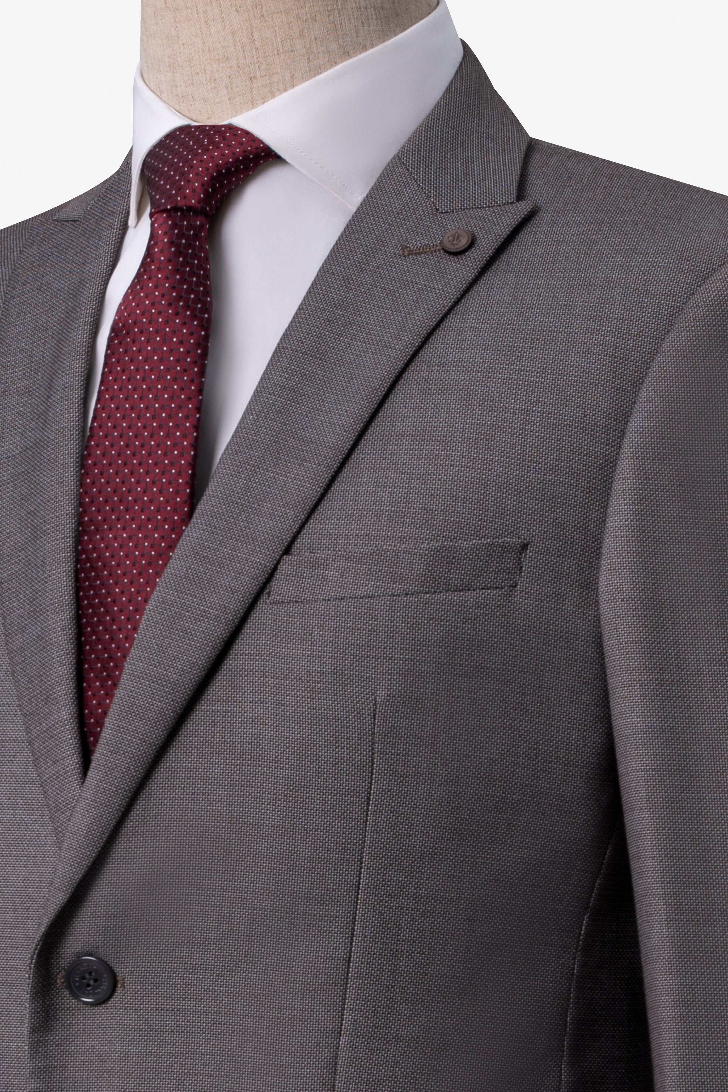 Grey suit jacket with notch lapel, chest pocket, and two-button front