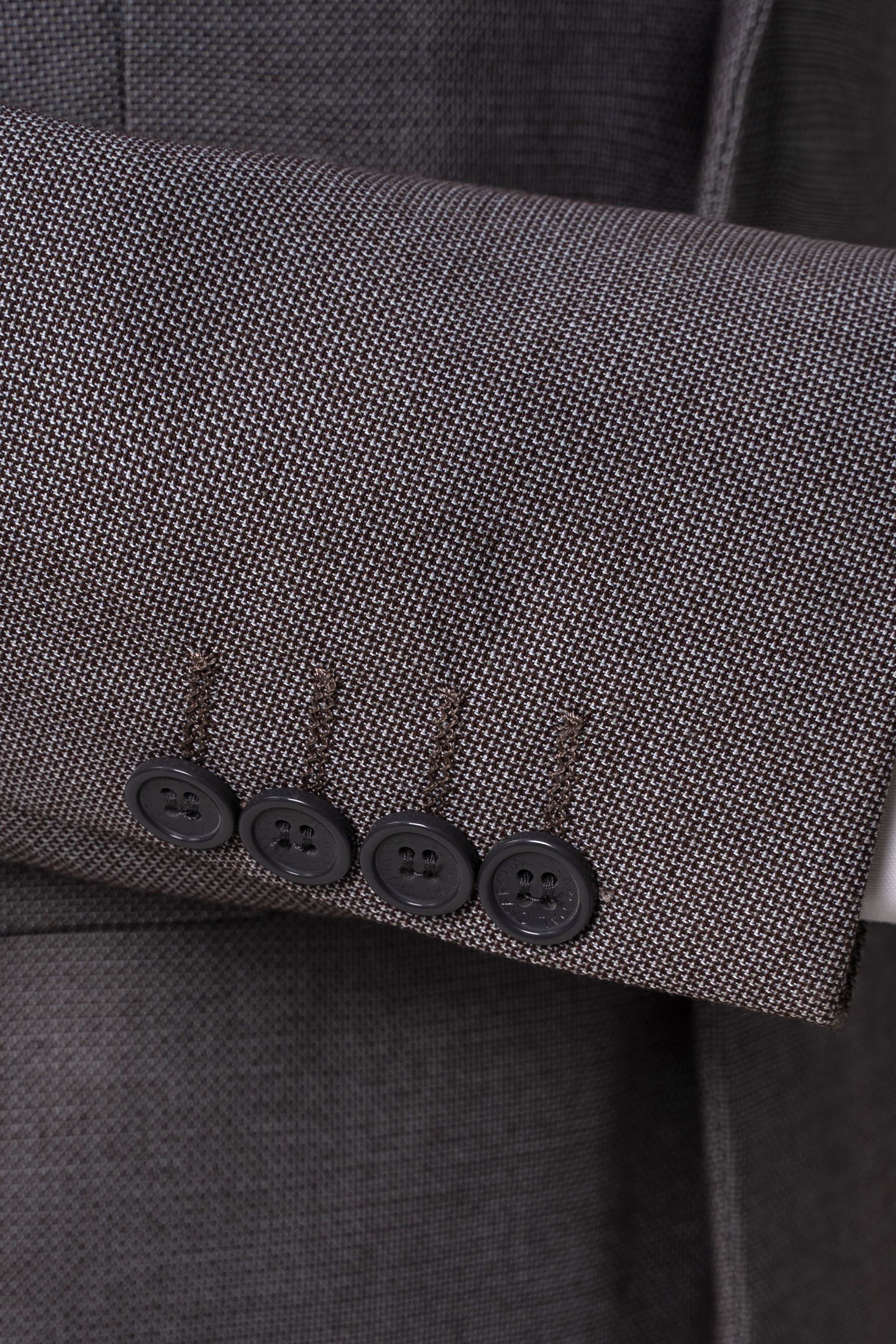 Grey suit jacket cuff with four-button detail