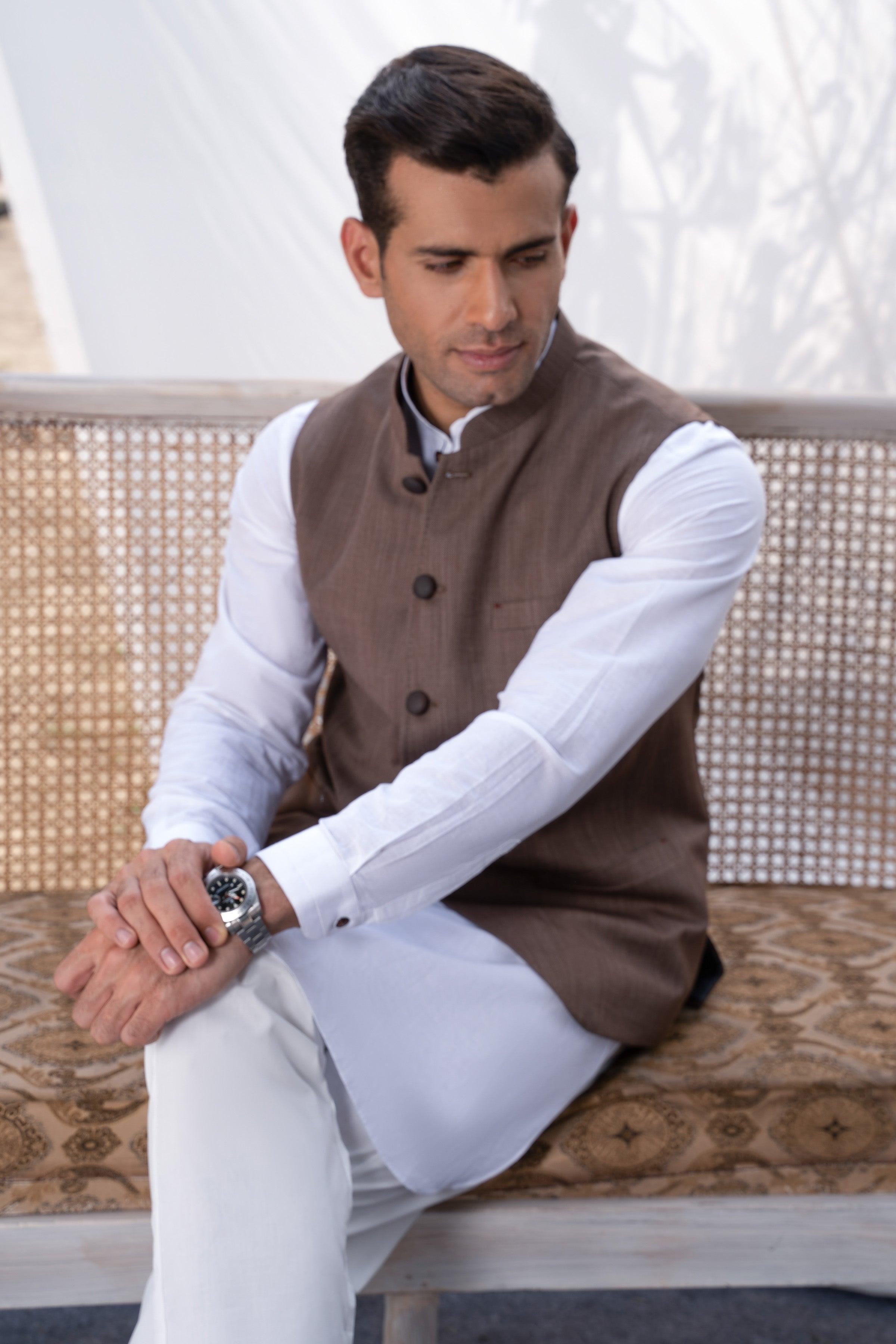Brown waistcoat with button front, worn with white shirt